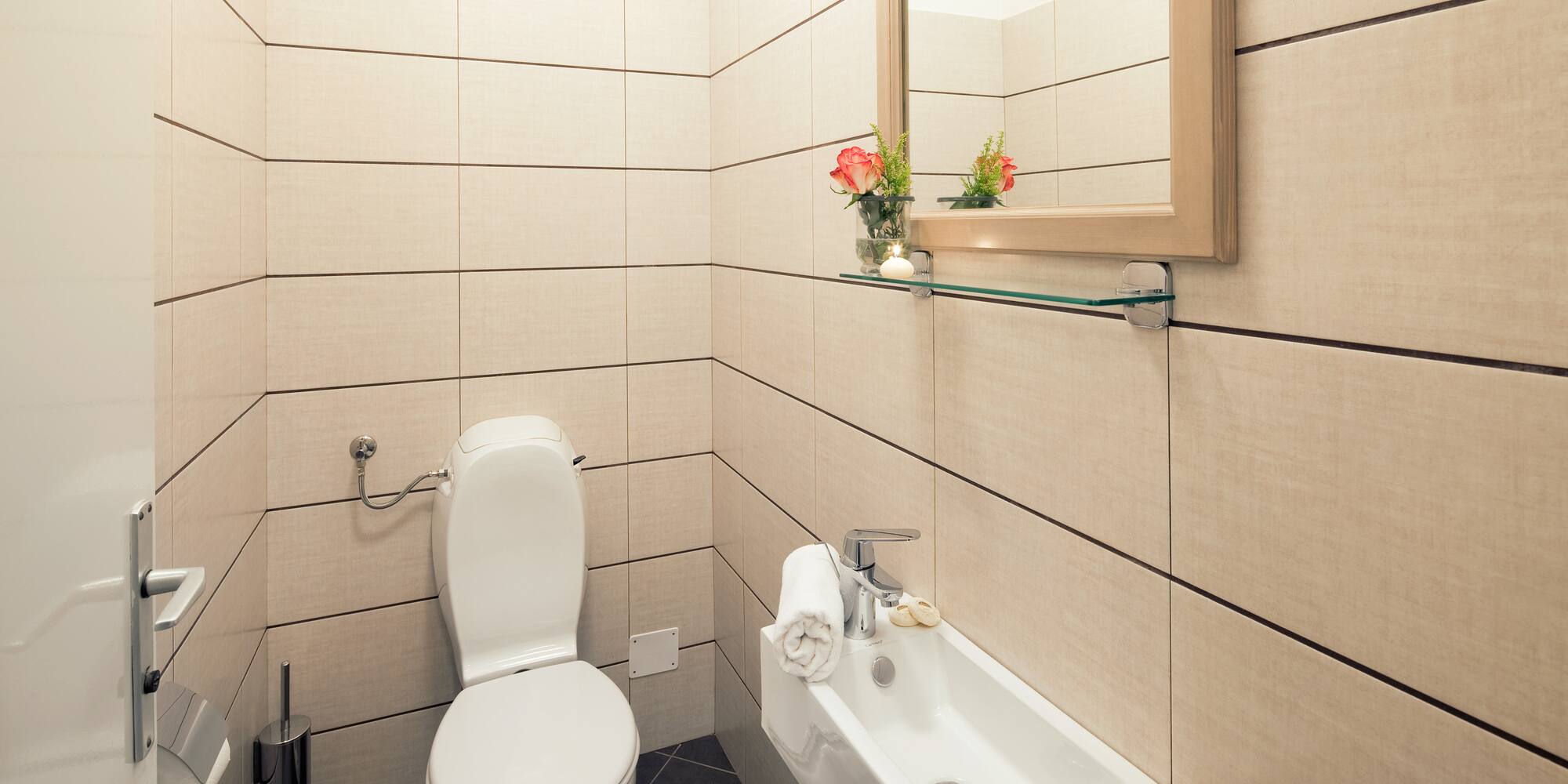 a bathroom with a toilet and sink