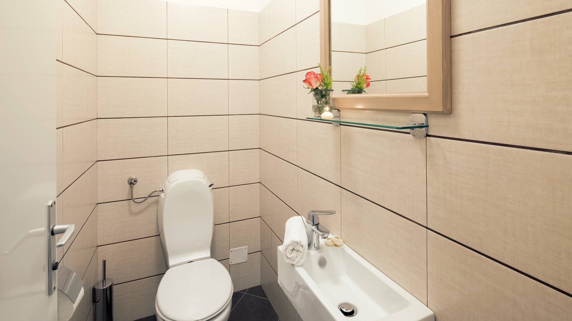 a bathroom with a toilet and sink