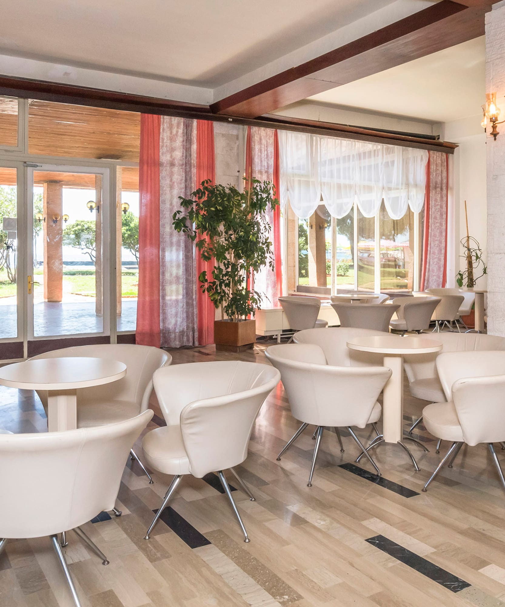 a room with tables and chairs