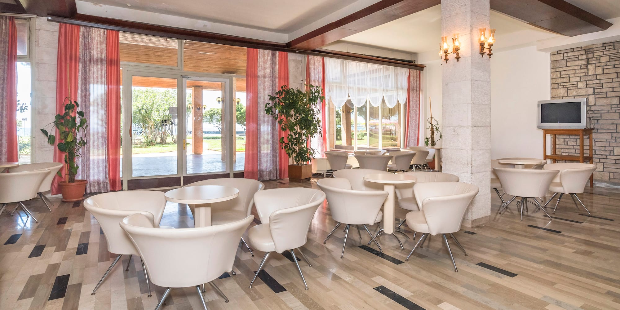 a room with tables and chairs