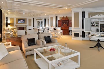 a room with white walls and a couch