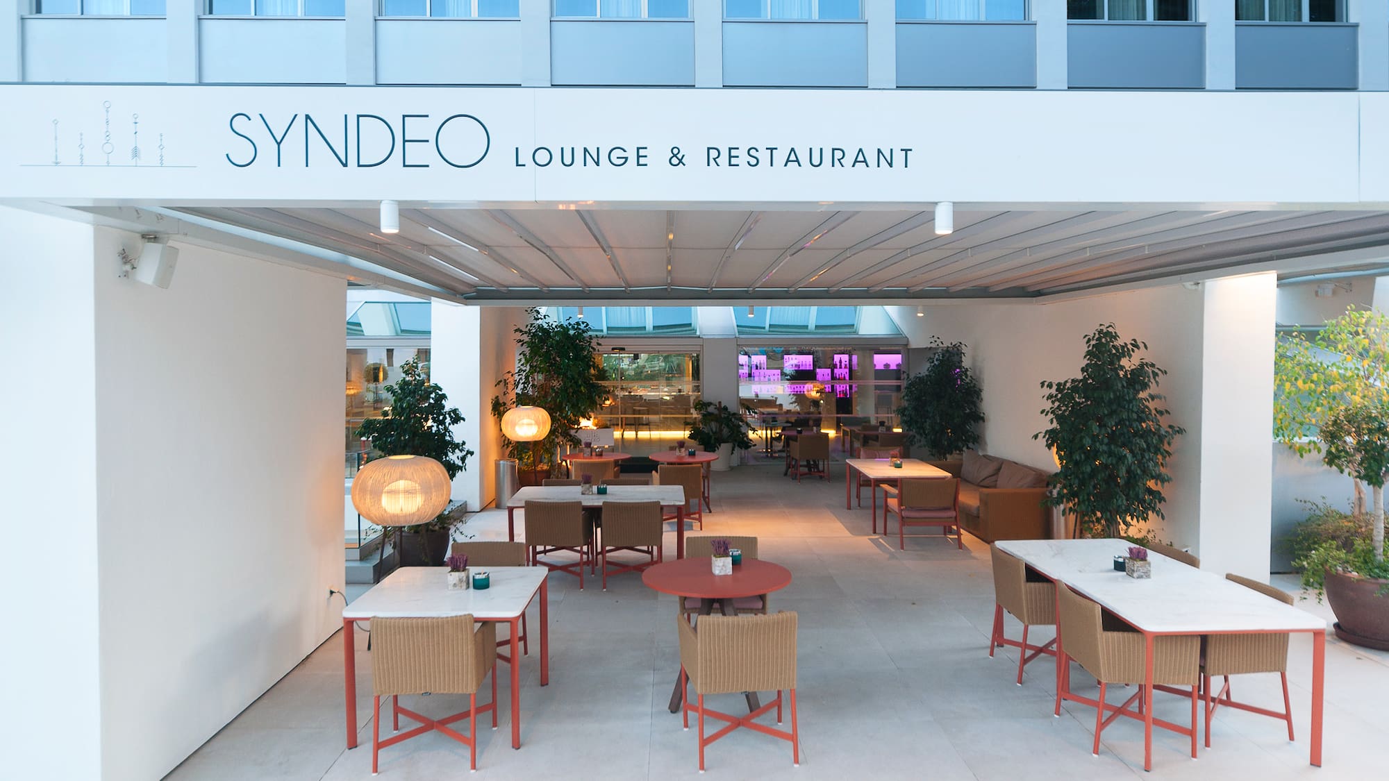 a restaurant with tables and chairs