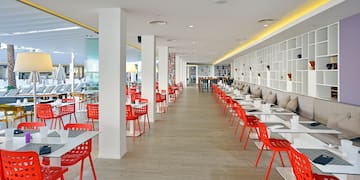 a room with tables and chairs