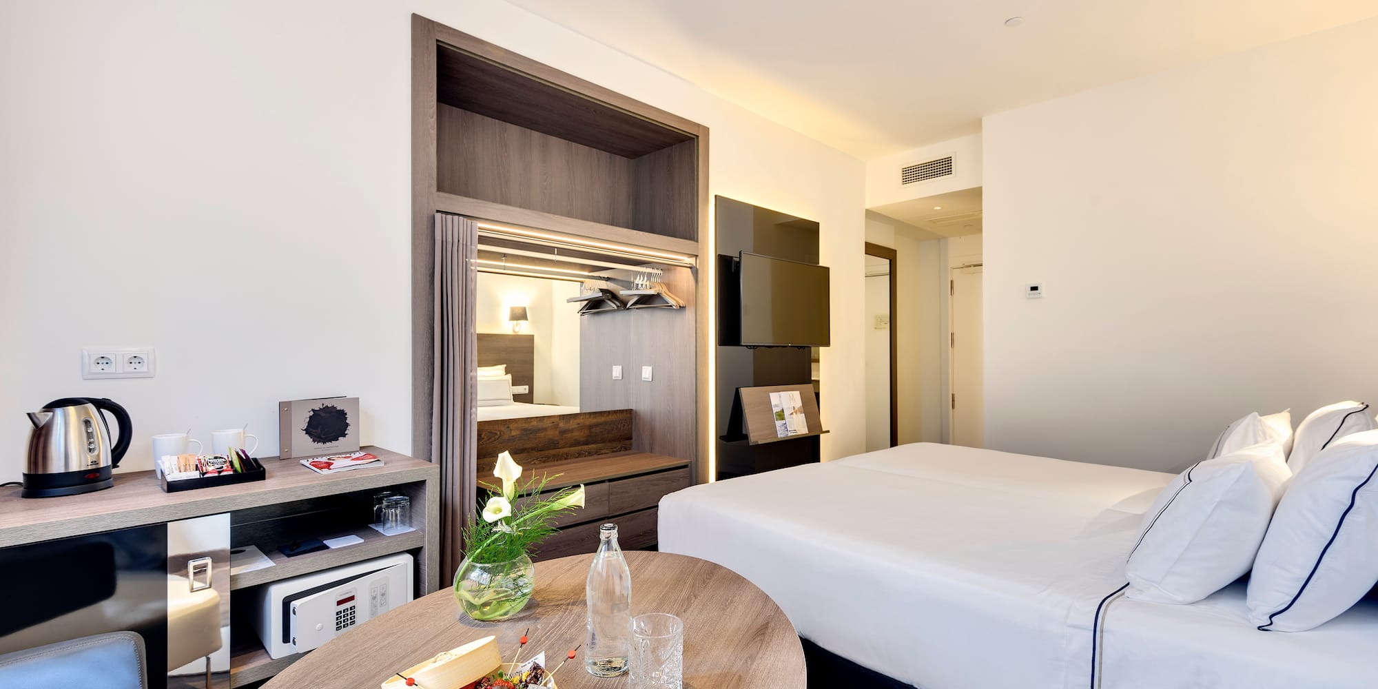 a room with a bed and a table