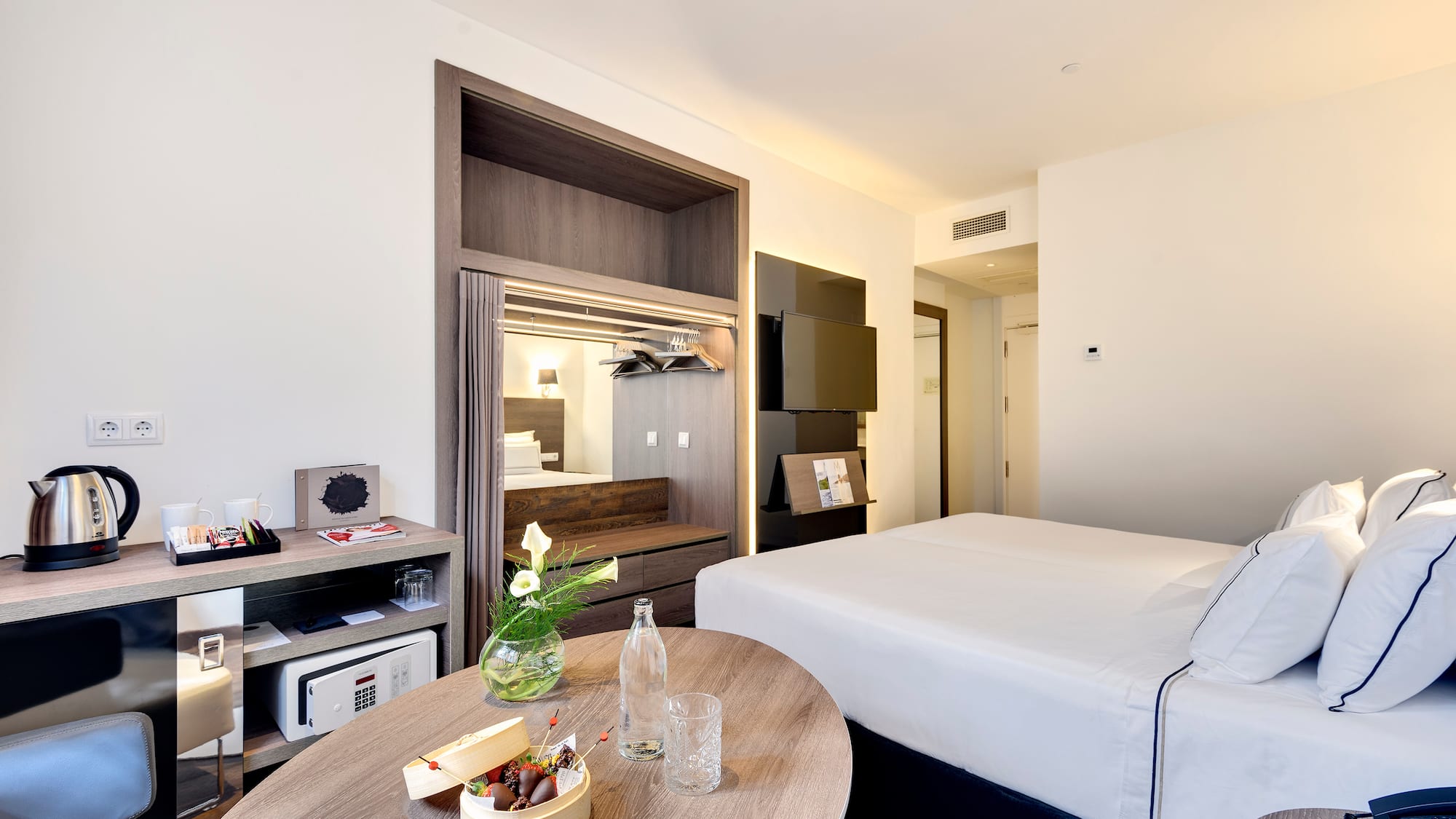 a room with a bed and a table