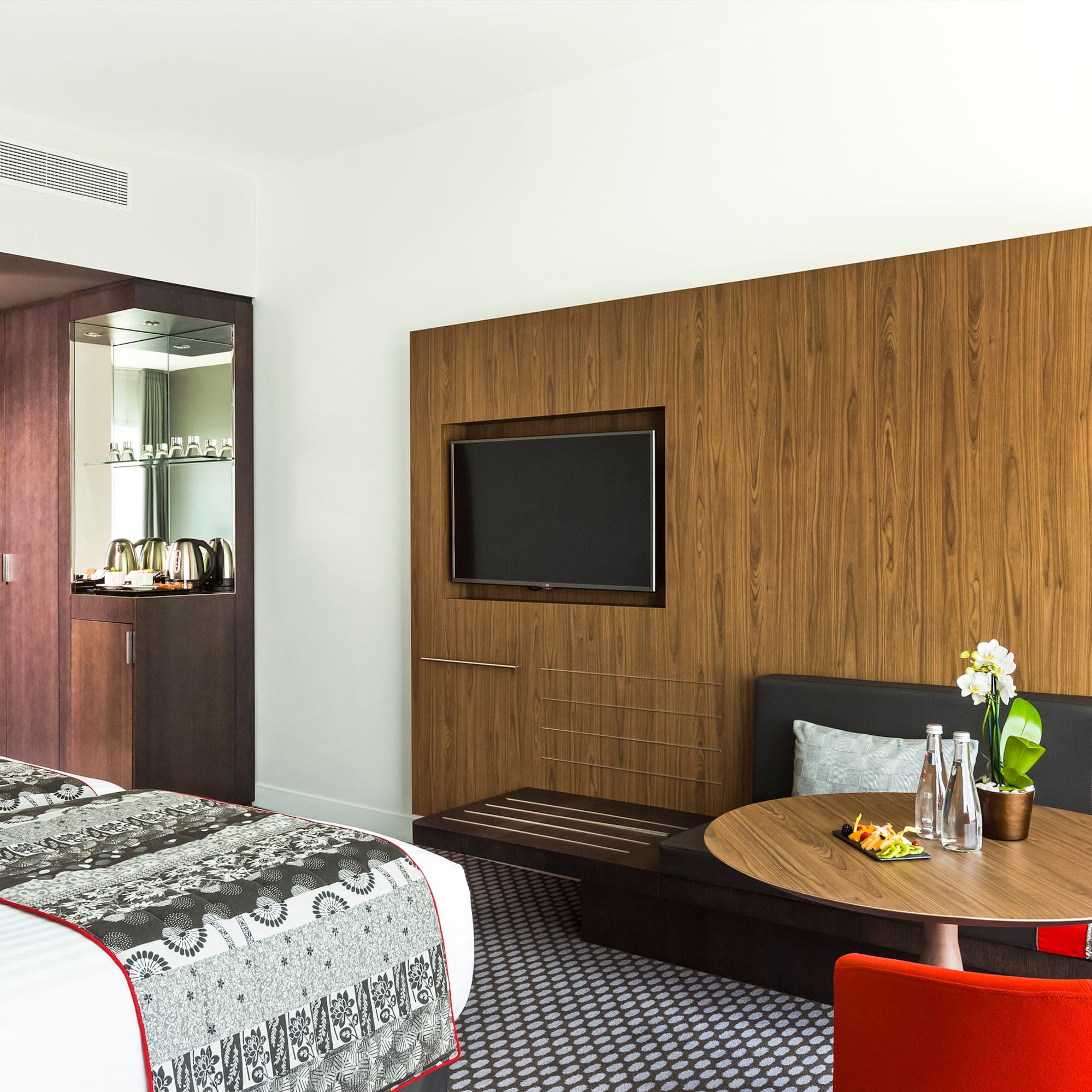 a room with a bed and a table