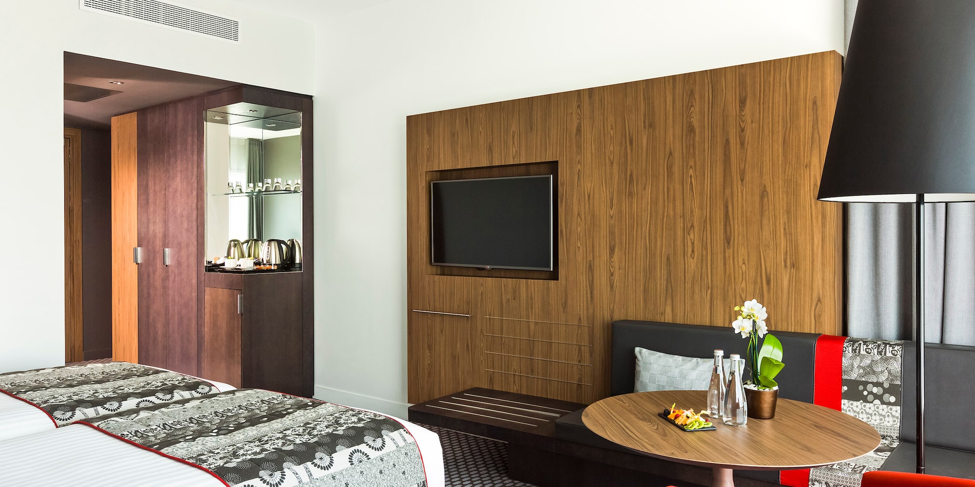 a room with a bed and a table