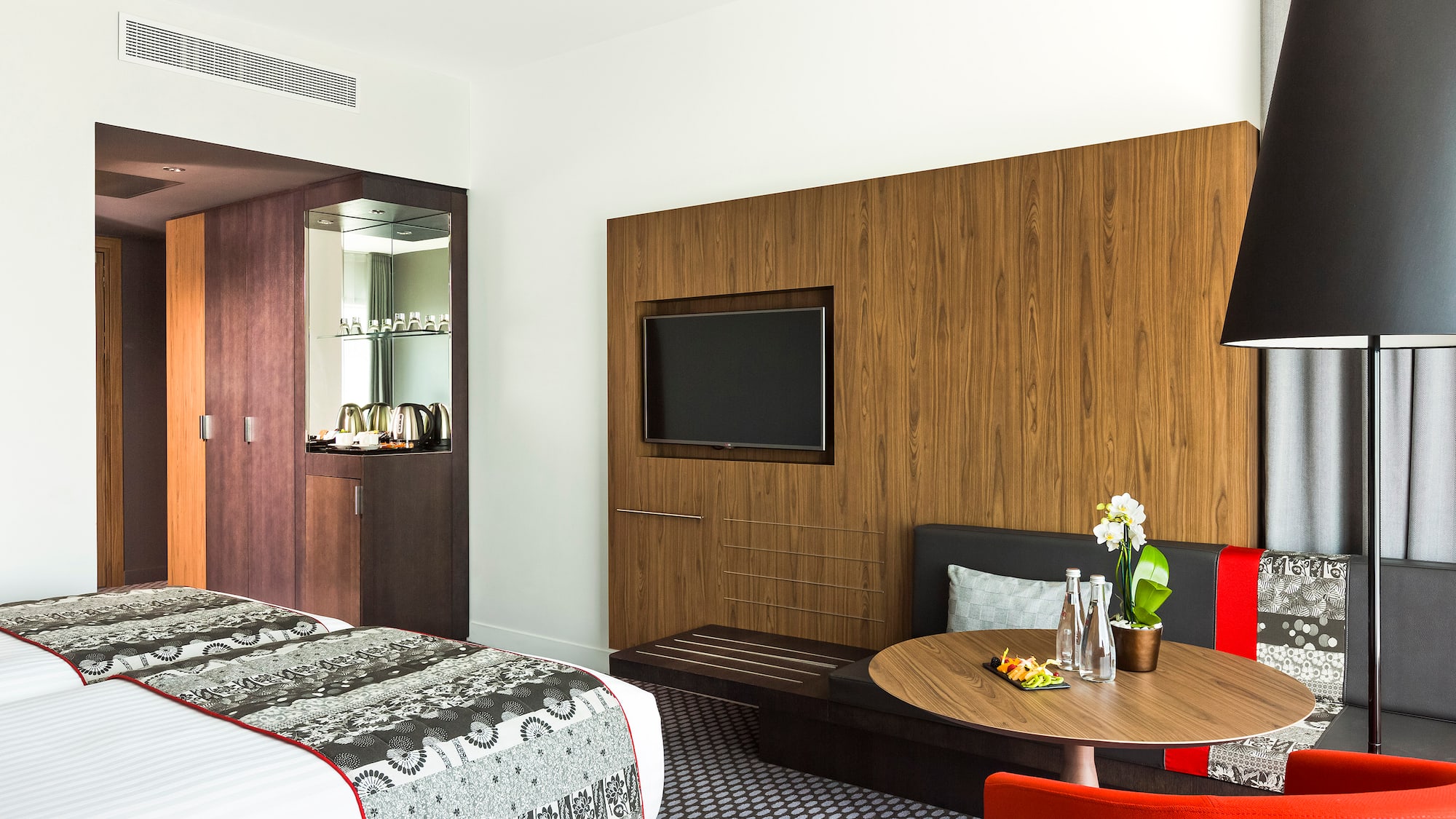 a room with a bed and a table