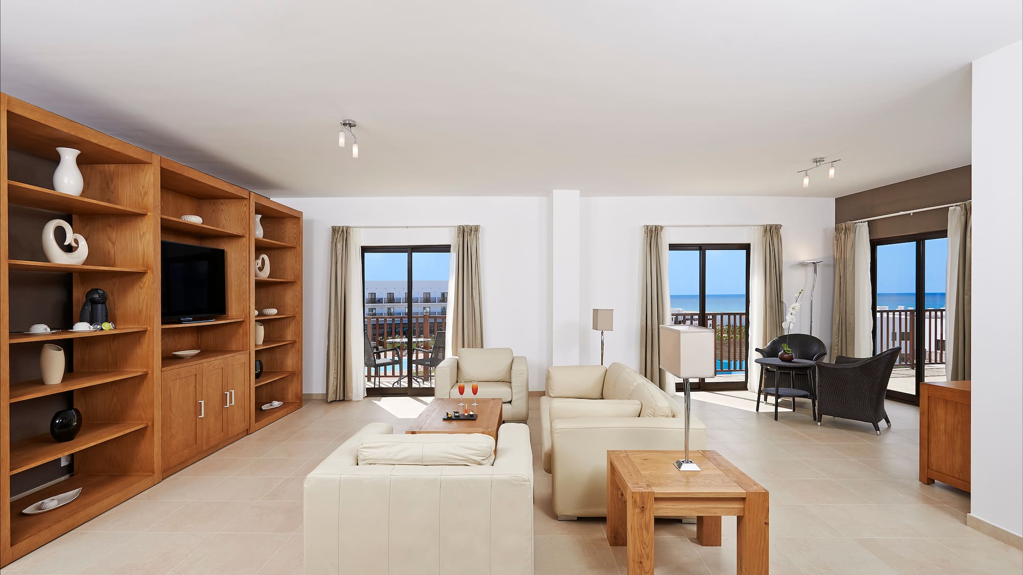 a living room with a television and a couch