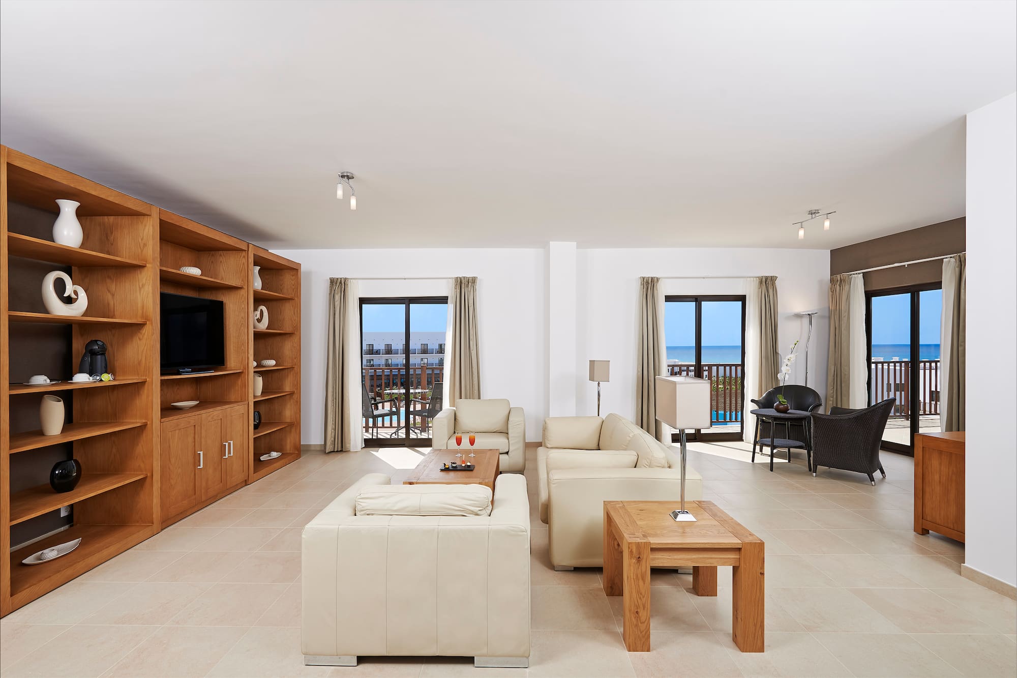 a living room with a television and a couch