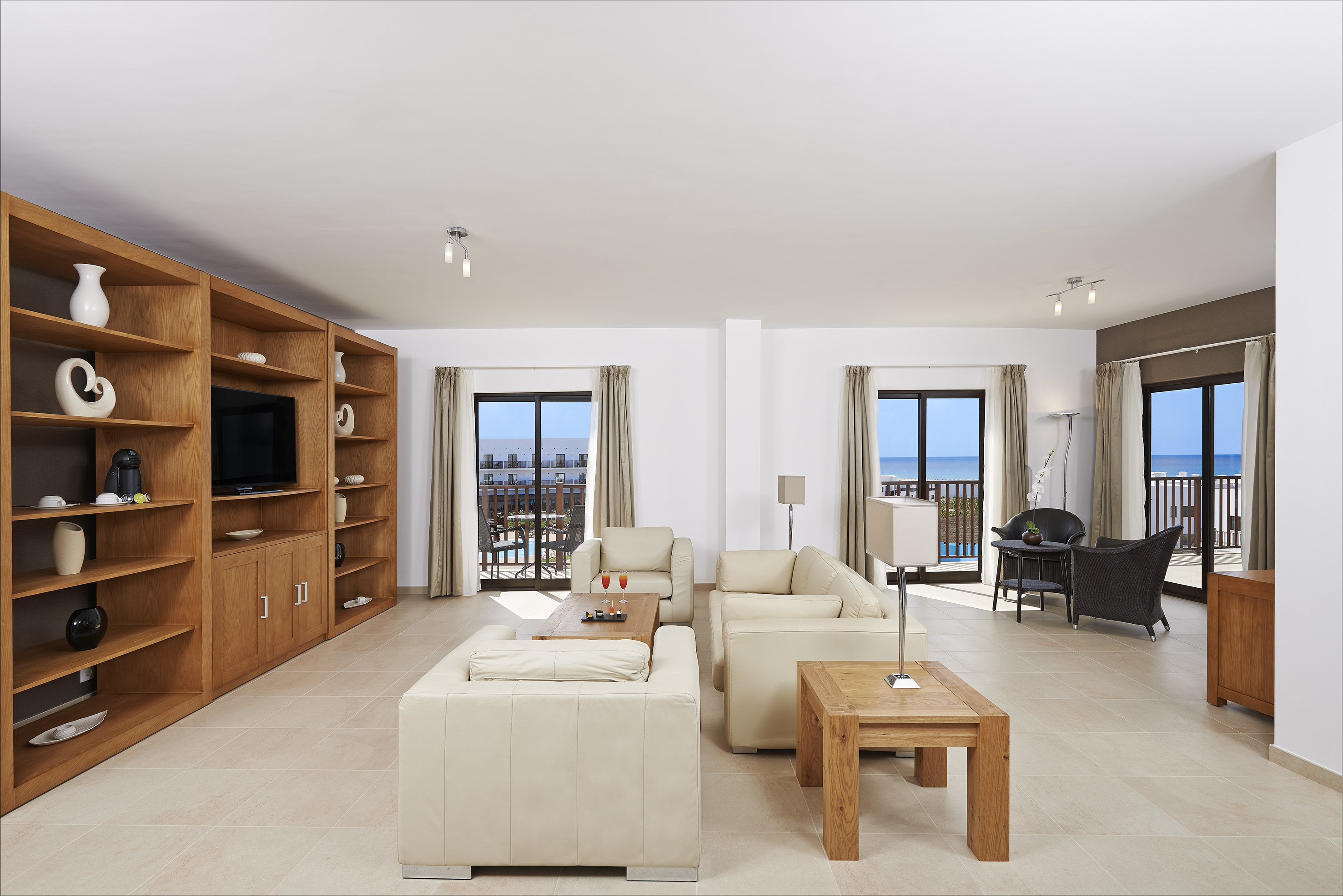 a living room with a television and a couch