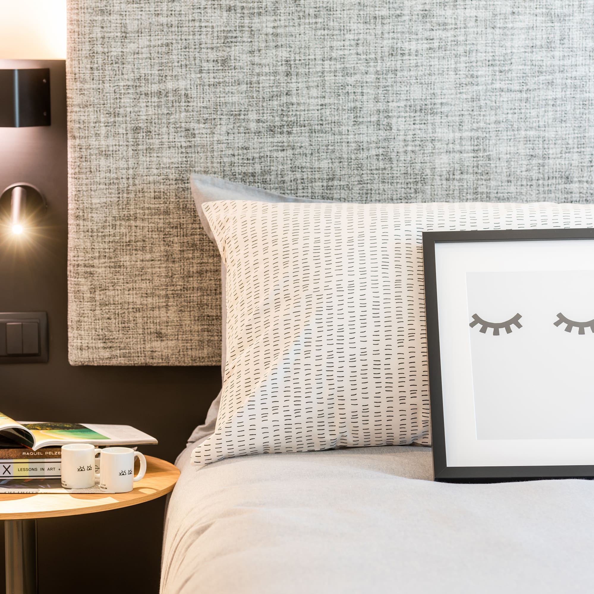 a picture frame on a bed