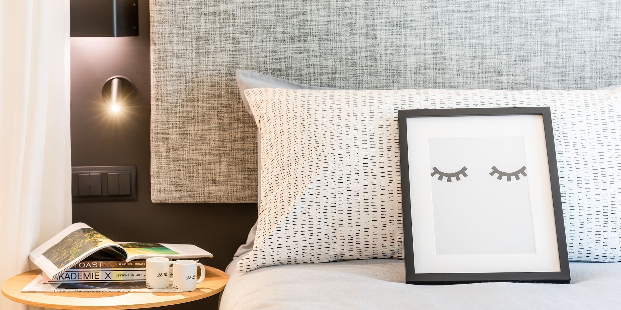 a picture frame on a bed