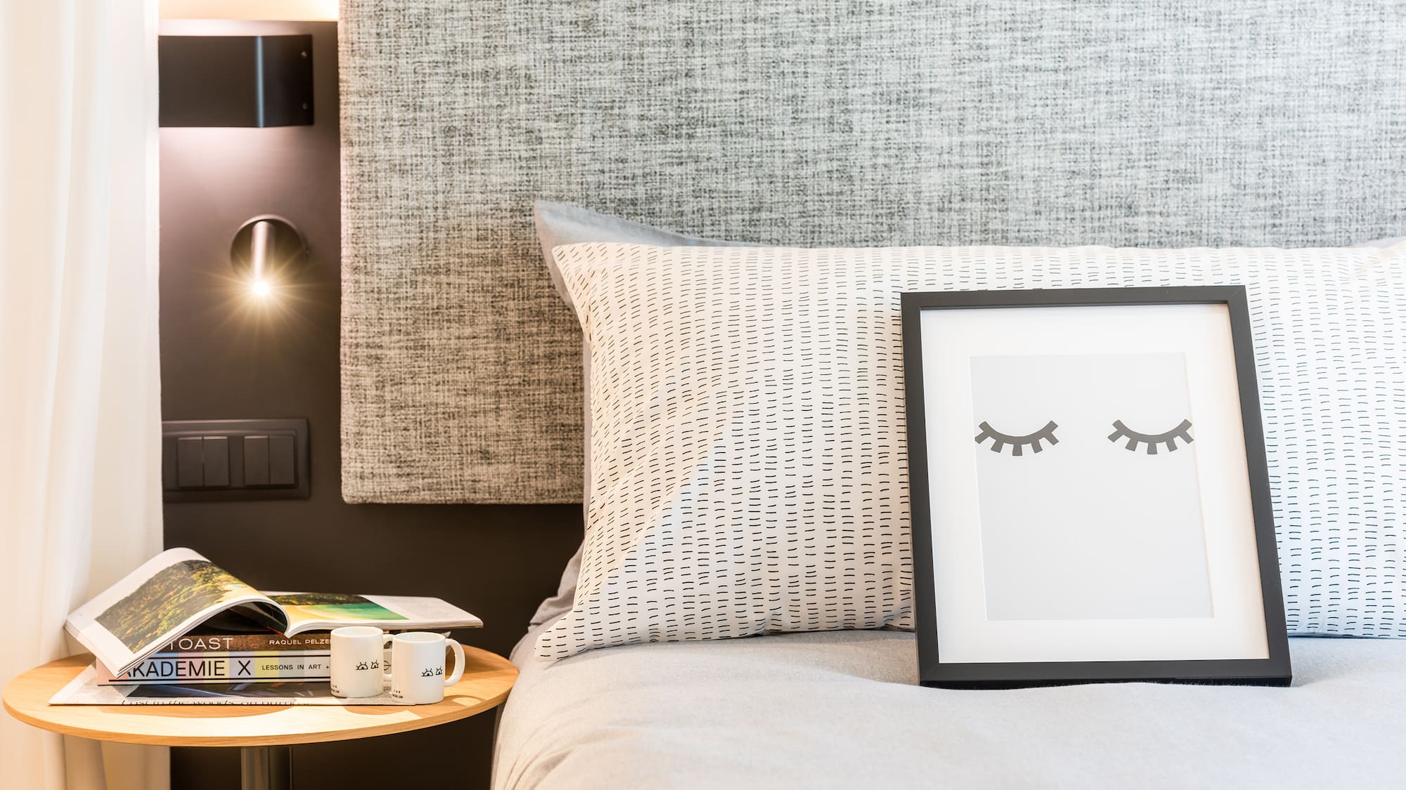 a picture frame on a bed