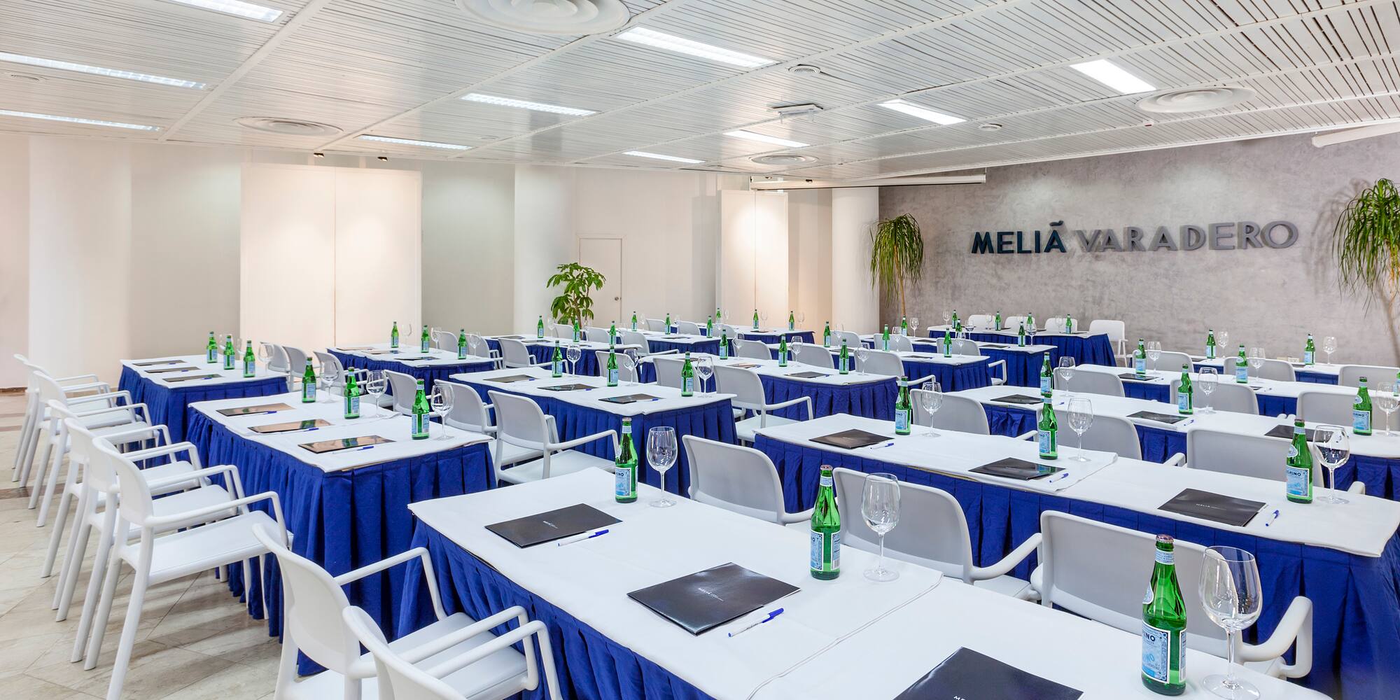 a room with tables and chairs