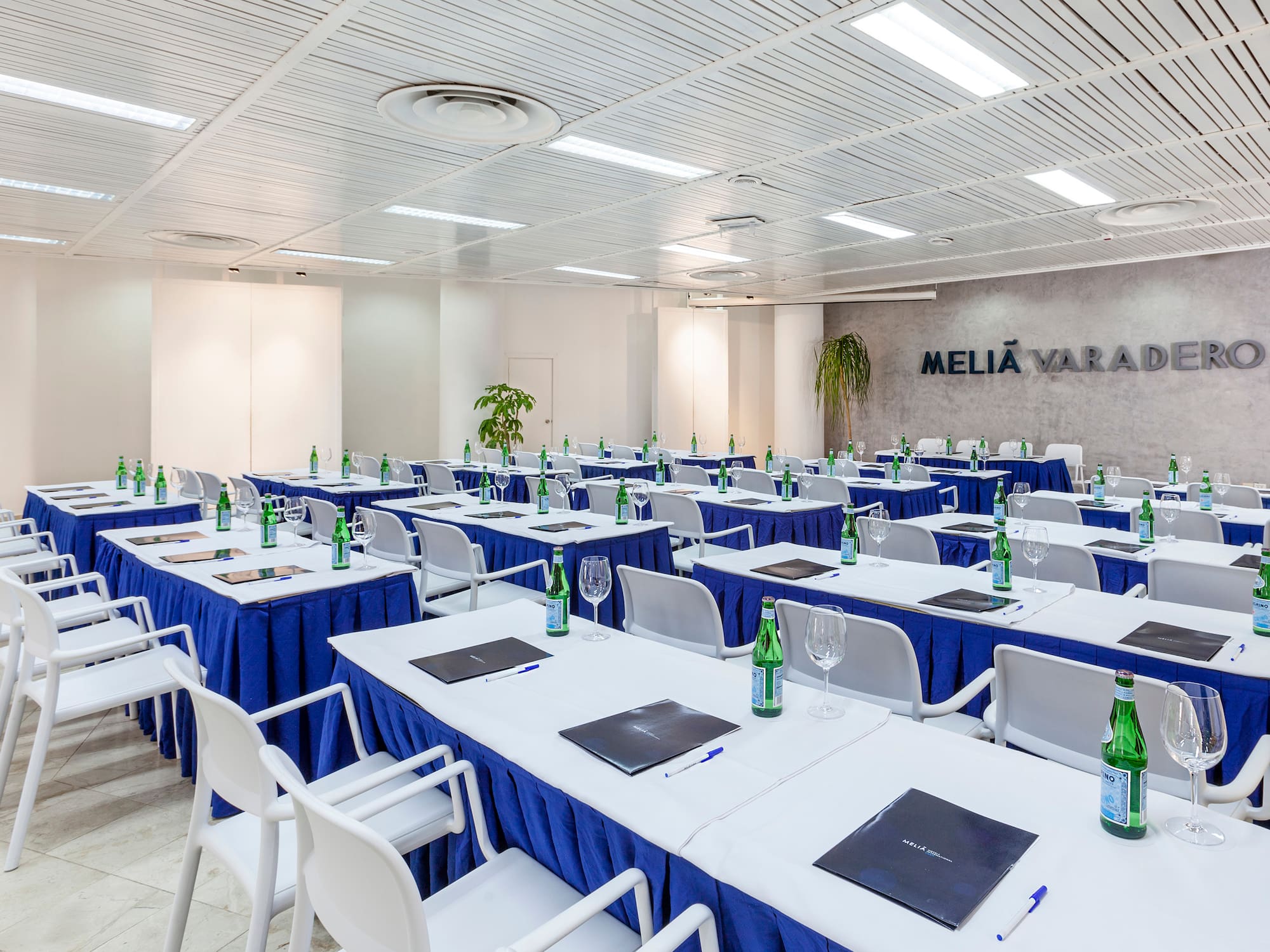 a room with tables and chairs