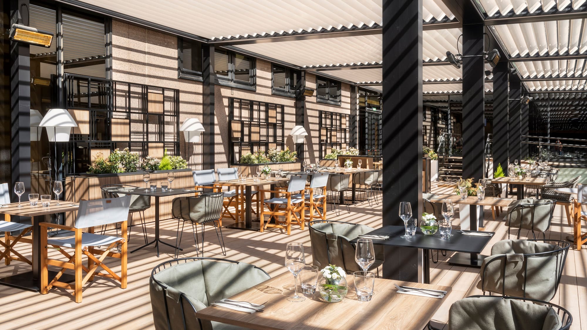 a restaurant with tables and chairs