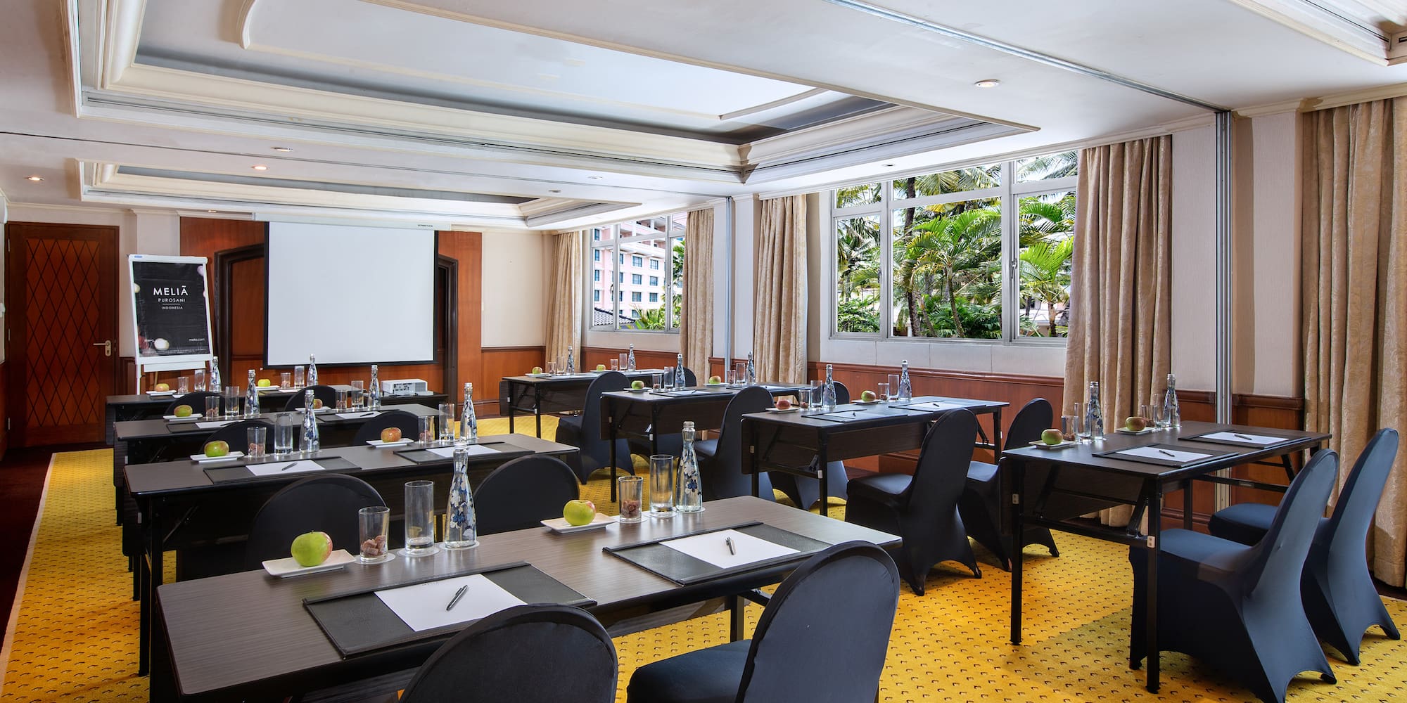 a room with tables and chairs