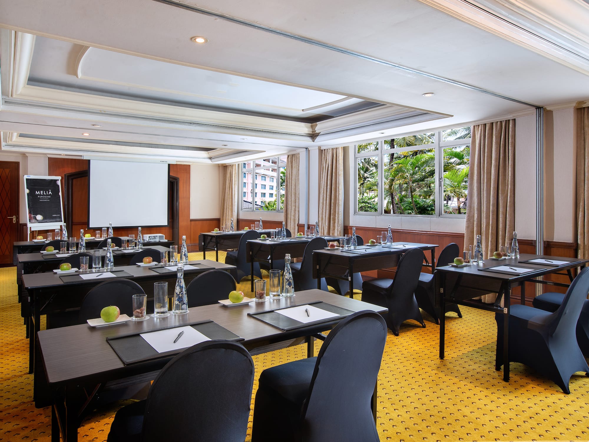 a room with tables and chairs