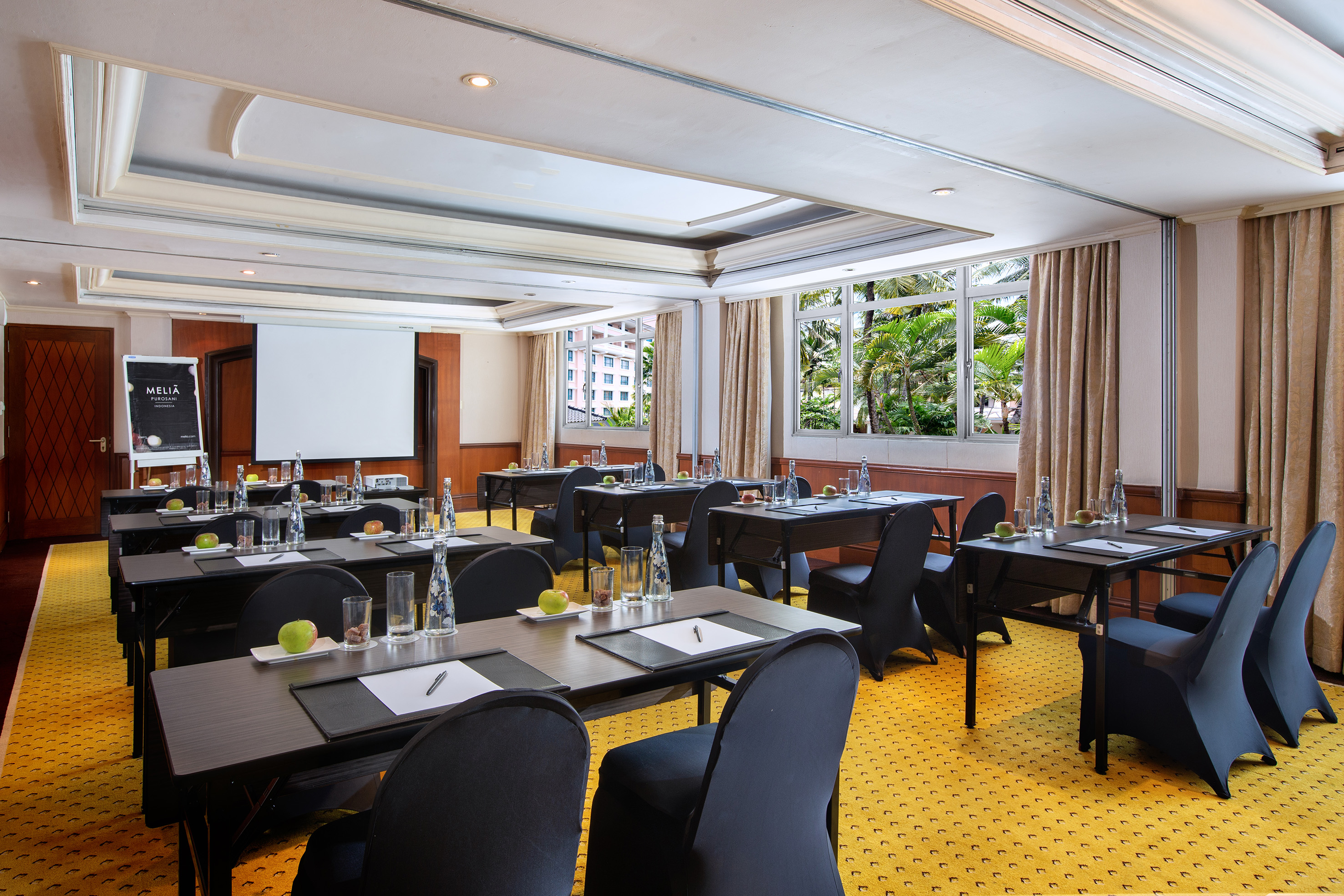 a room with tables and chairs