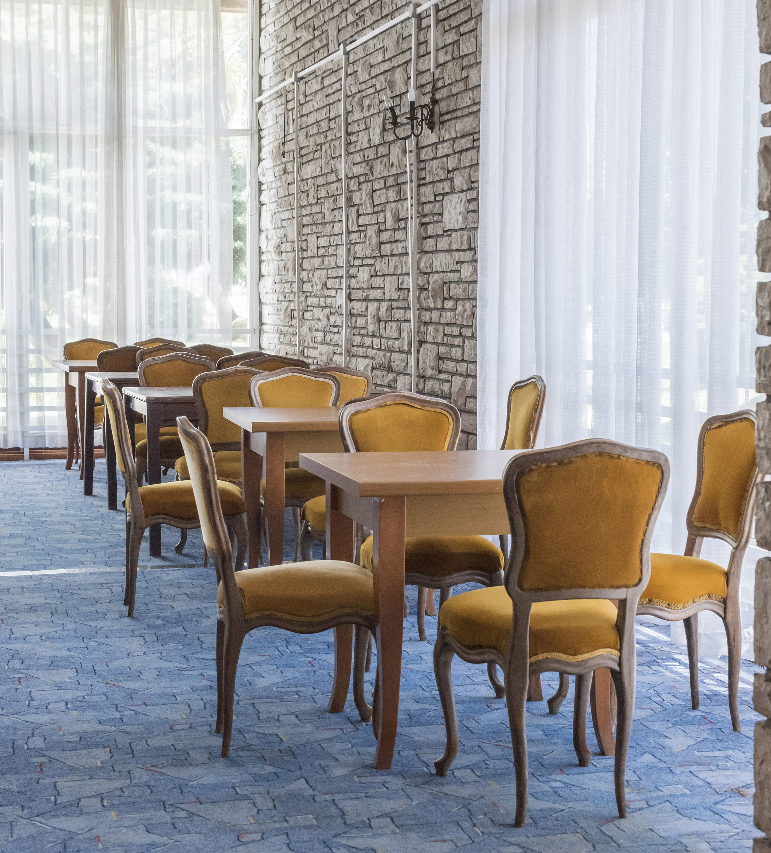 a room with tables and chairs