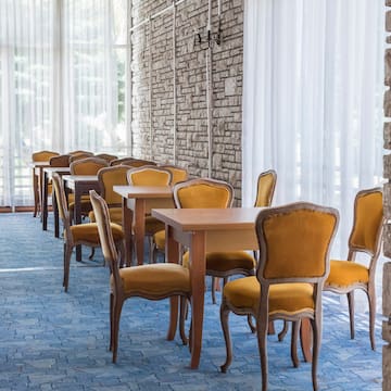 a room with tables and chairs