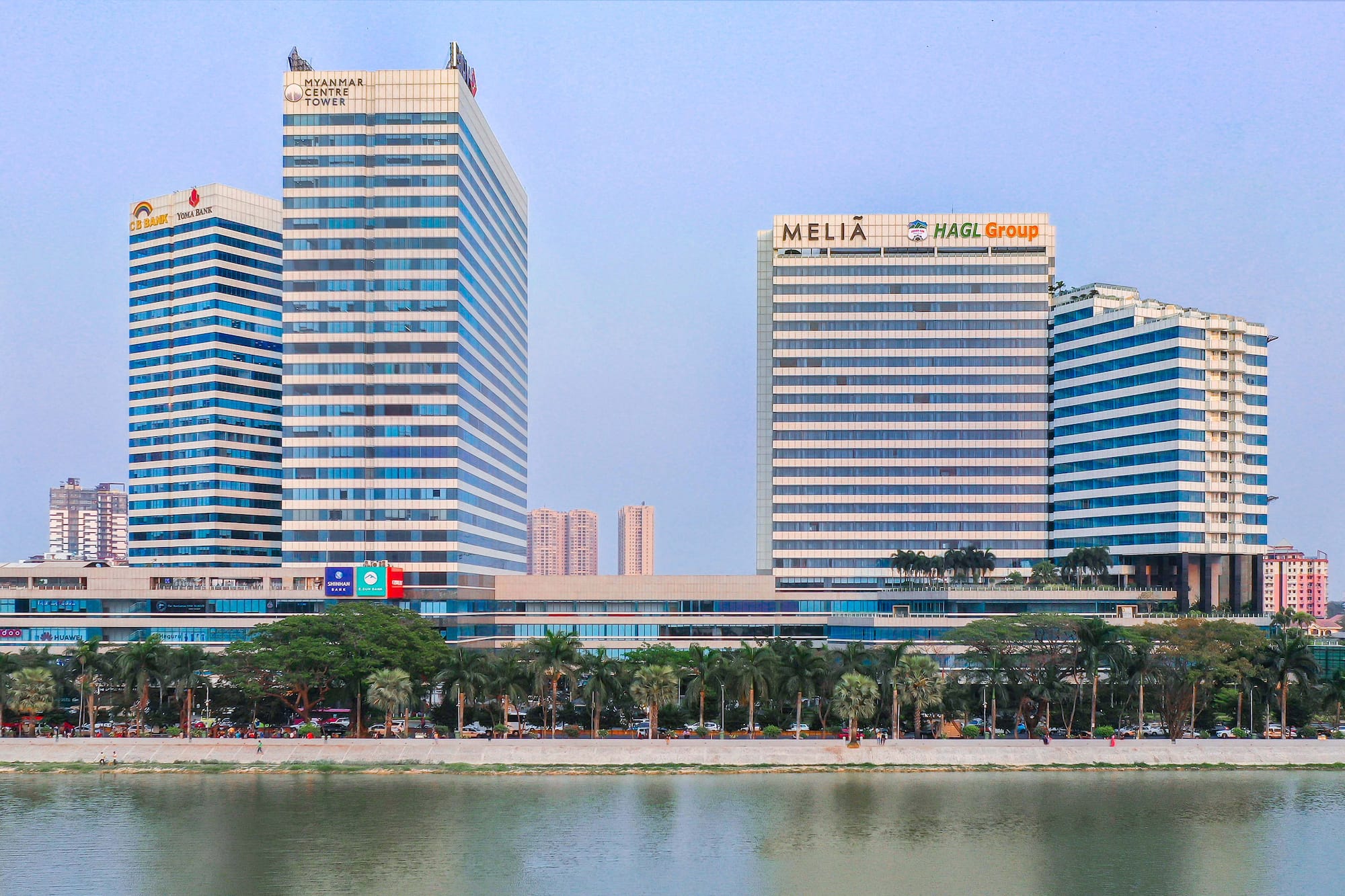 Yangon cityscape: Myanmar Centre Tower & Melia Hotel by Inya Lake.