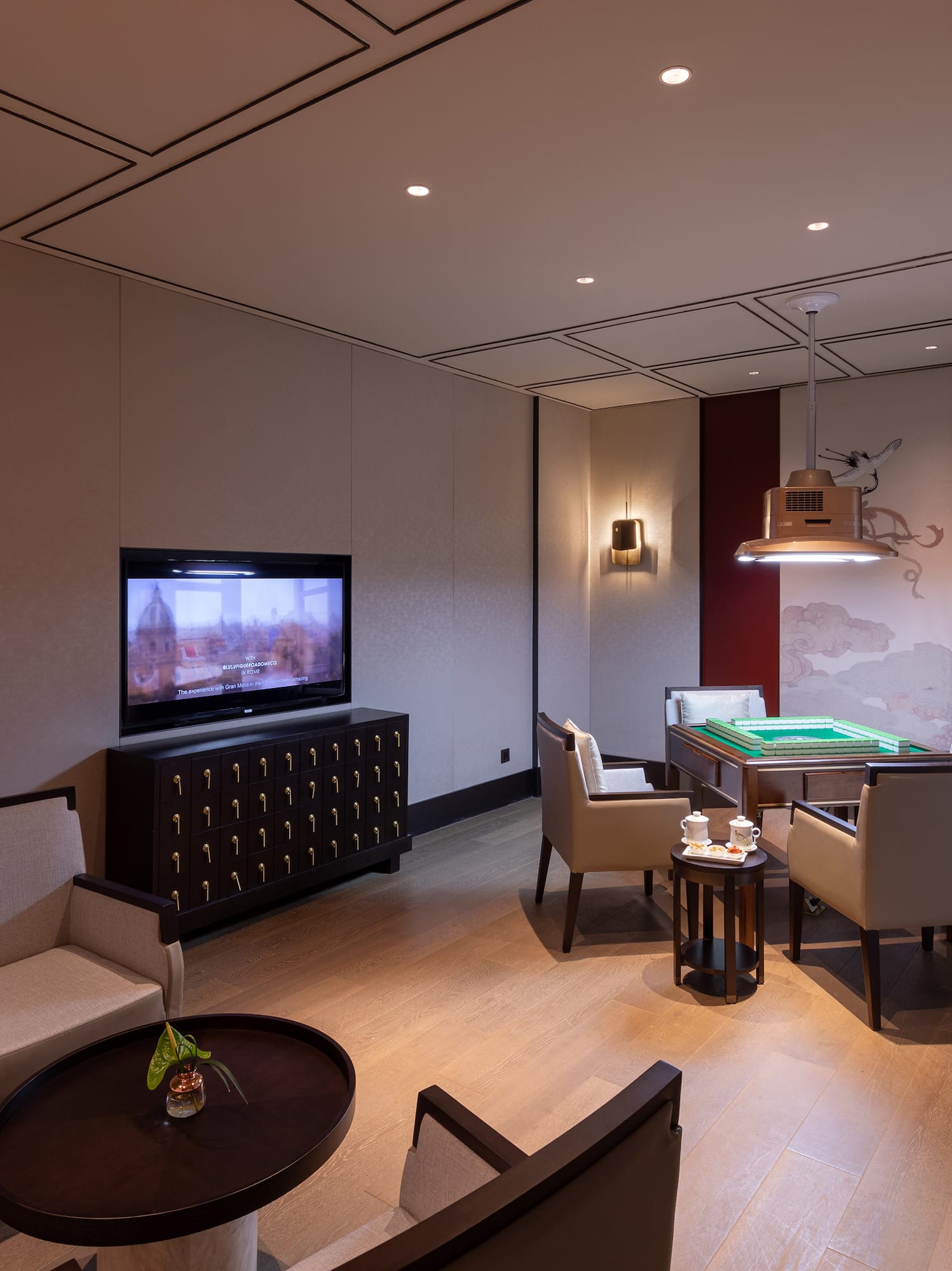 a room with a pool table and a television