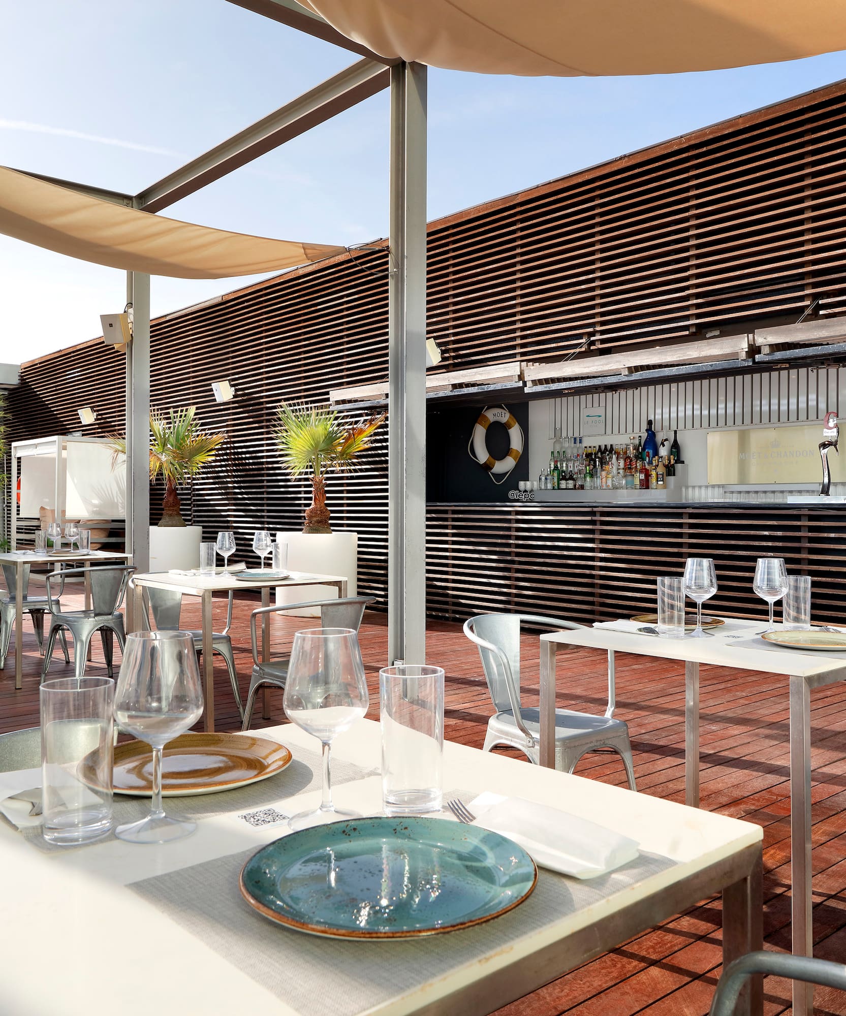 a table and chairs outside a building