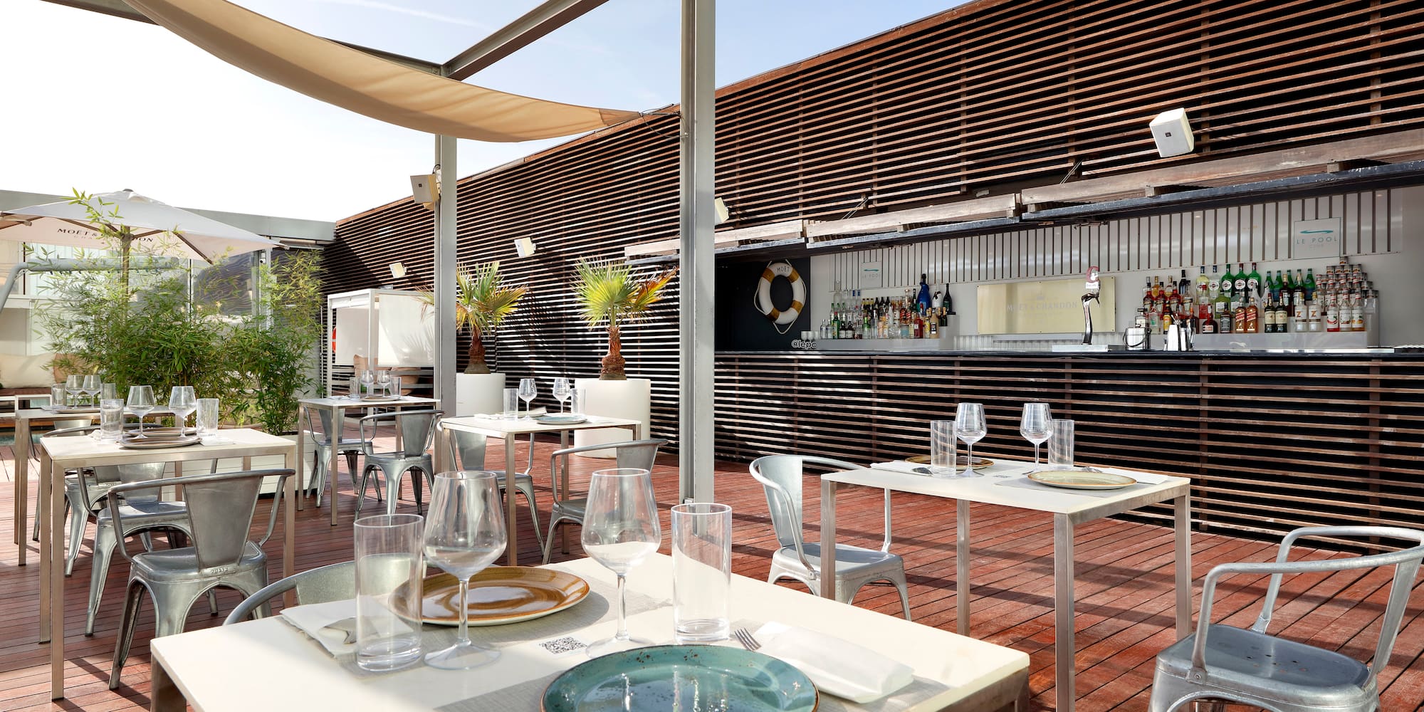 a table and chairs outside a building