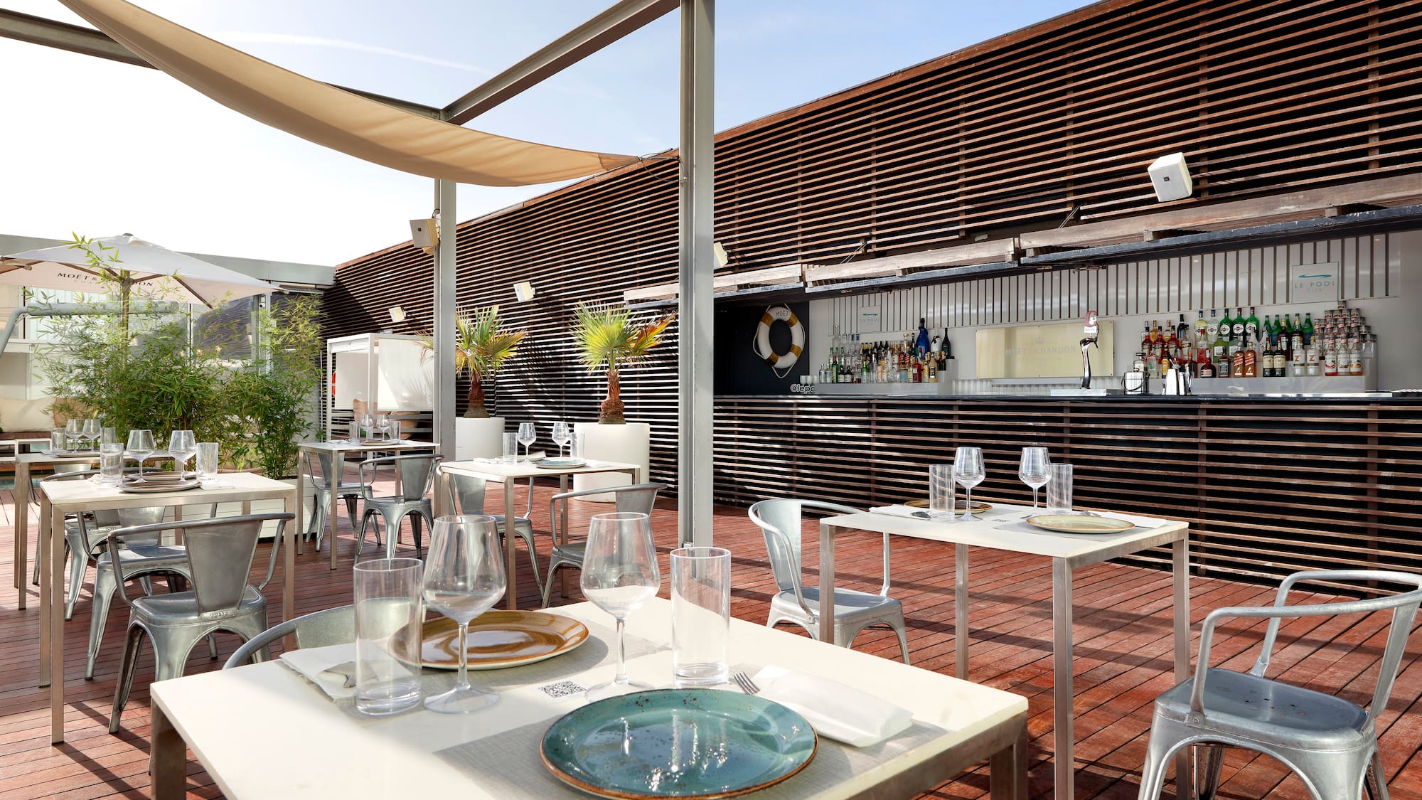 a table and chairs outside a building