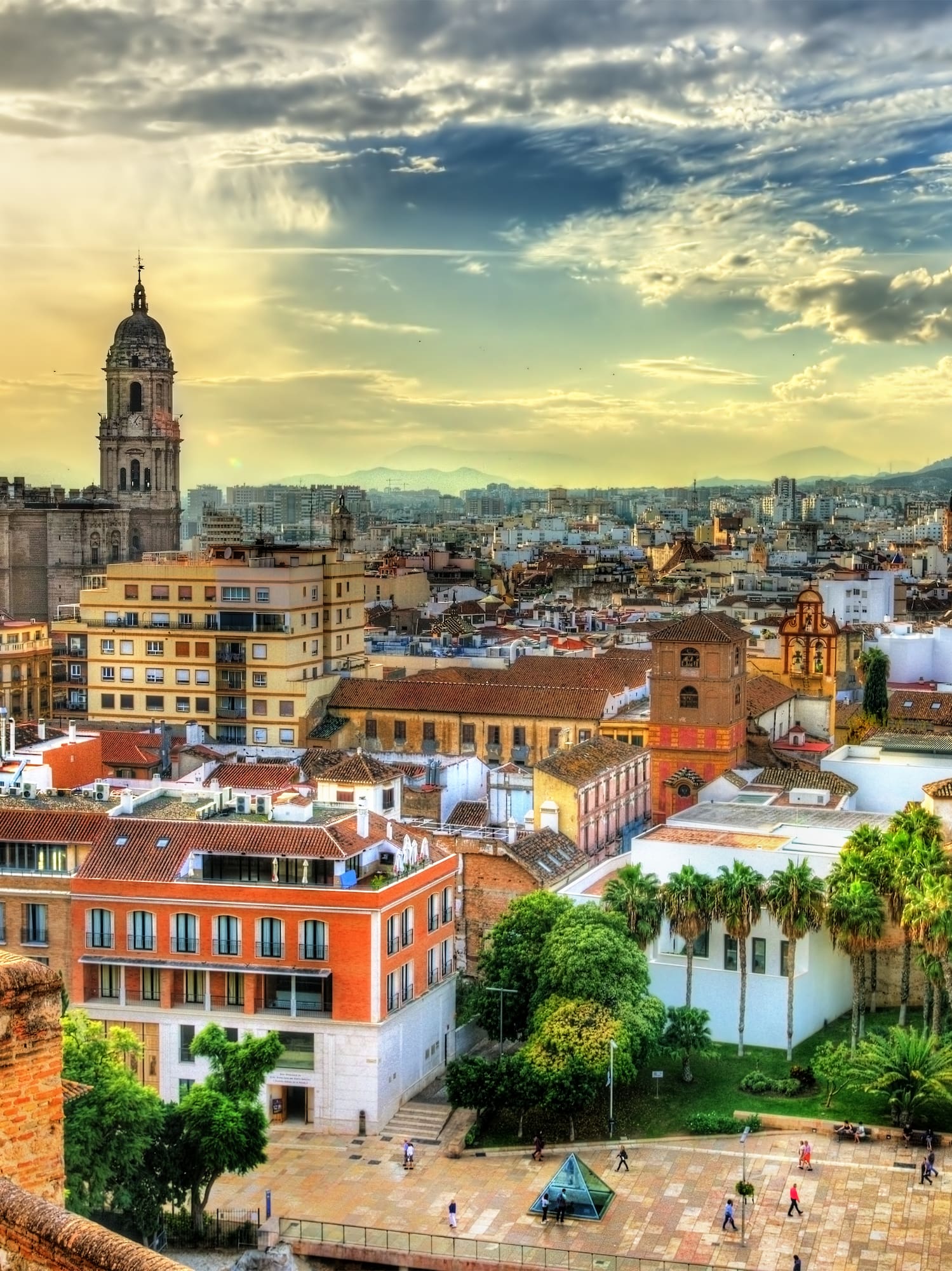 a city with many buildings and trees