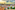 a city with many buildings and trees