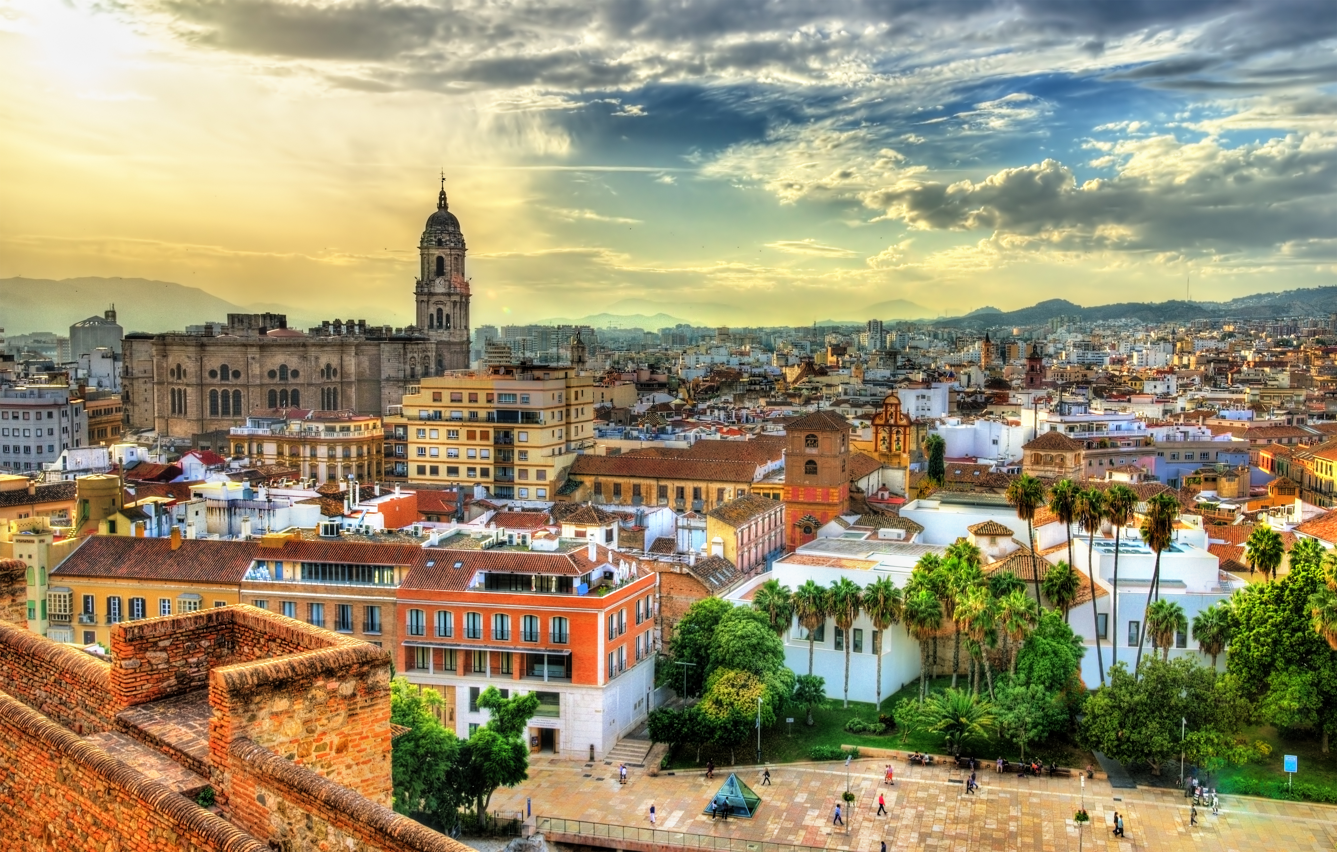 a city with many buildings and trees