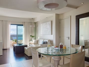 a room with a table and chairs
