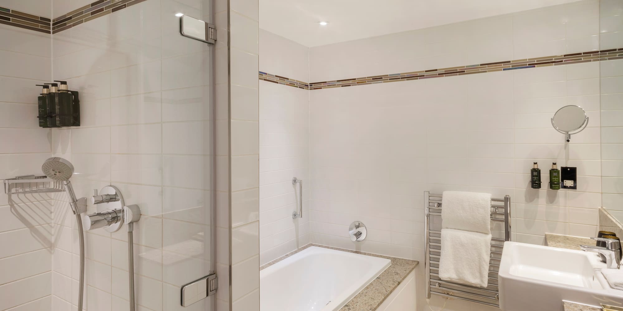 a bathroom with a shower and bathtub