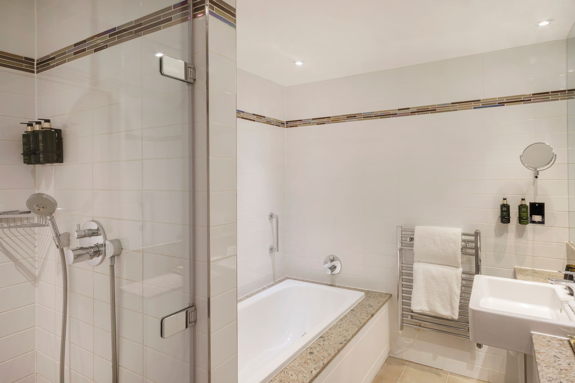 a bathroom with a shower and bathtub