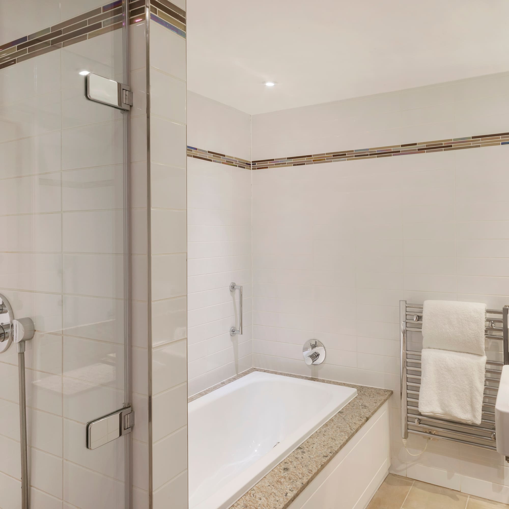 a bathroom with a shower and bathtub