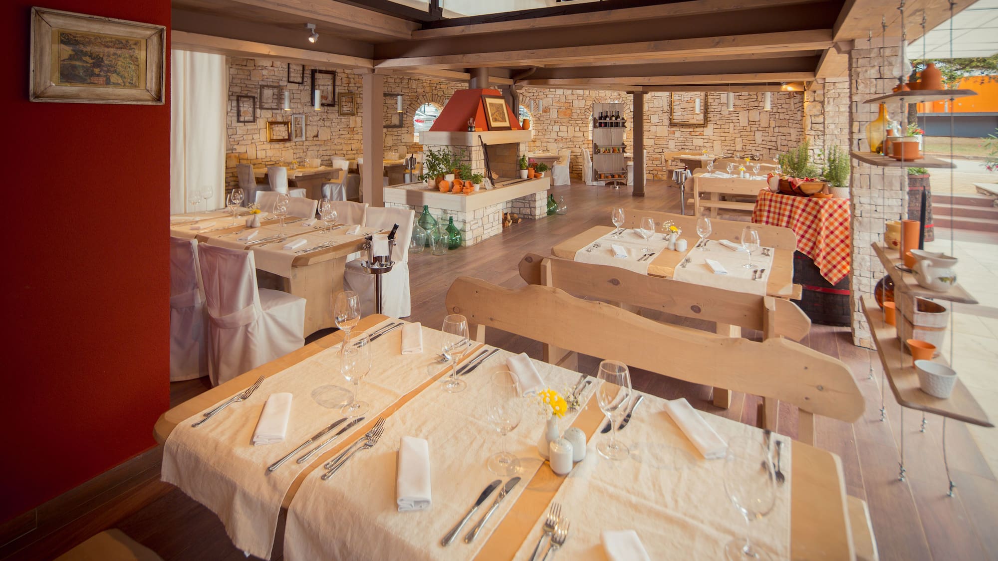 a restaurant with tables and chairs