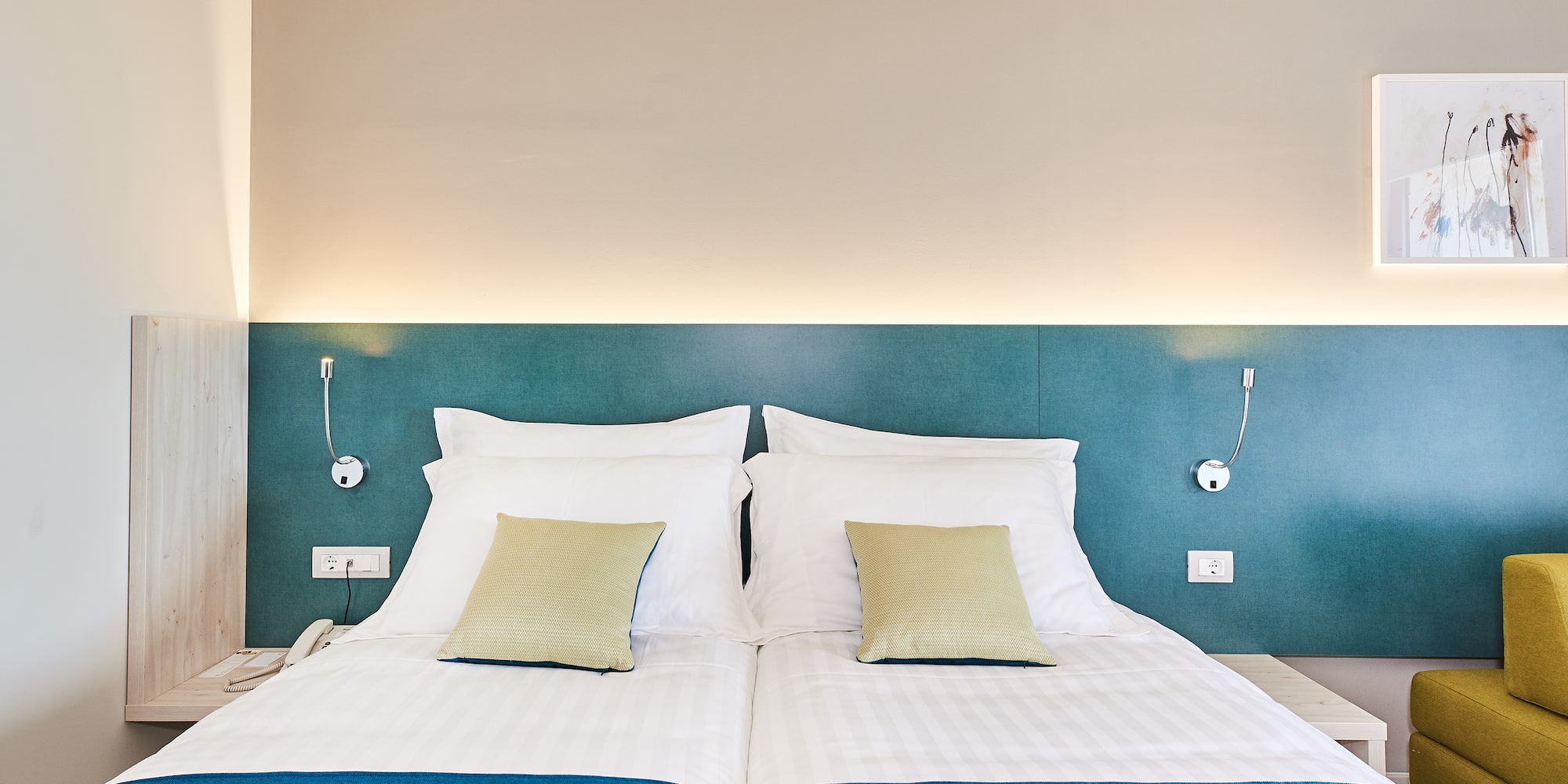 a bed with pillows on it