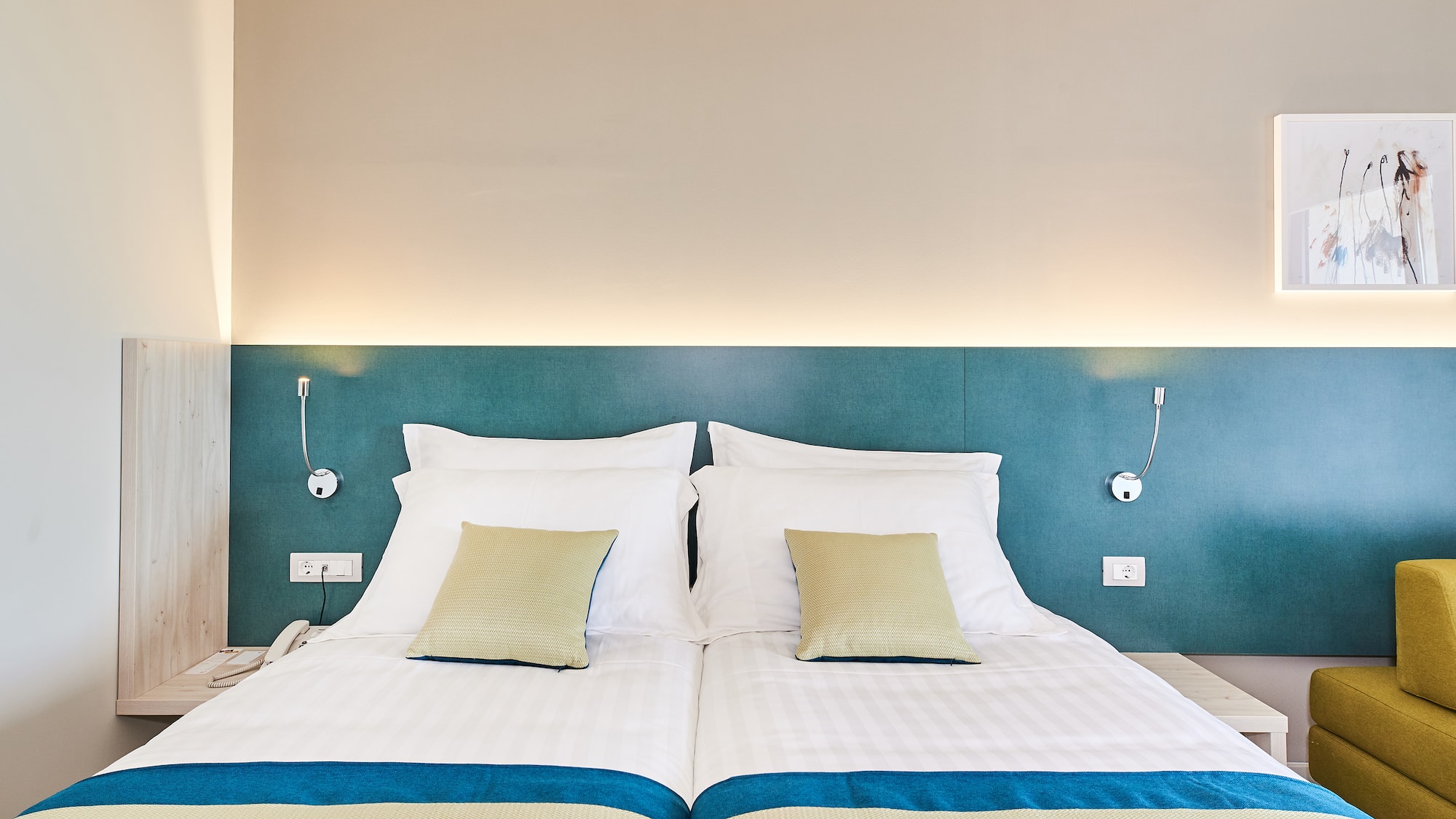 a bed with pillows on it