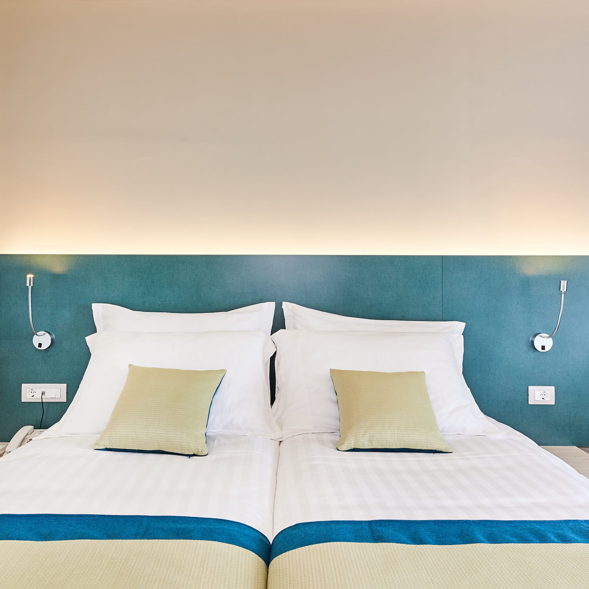 a bed with pillows on it