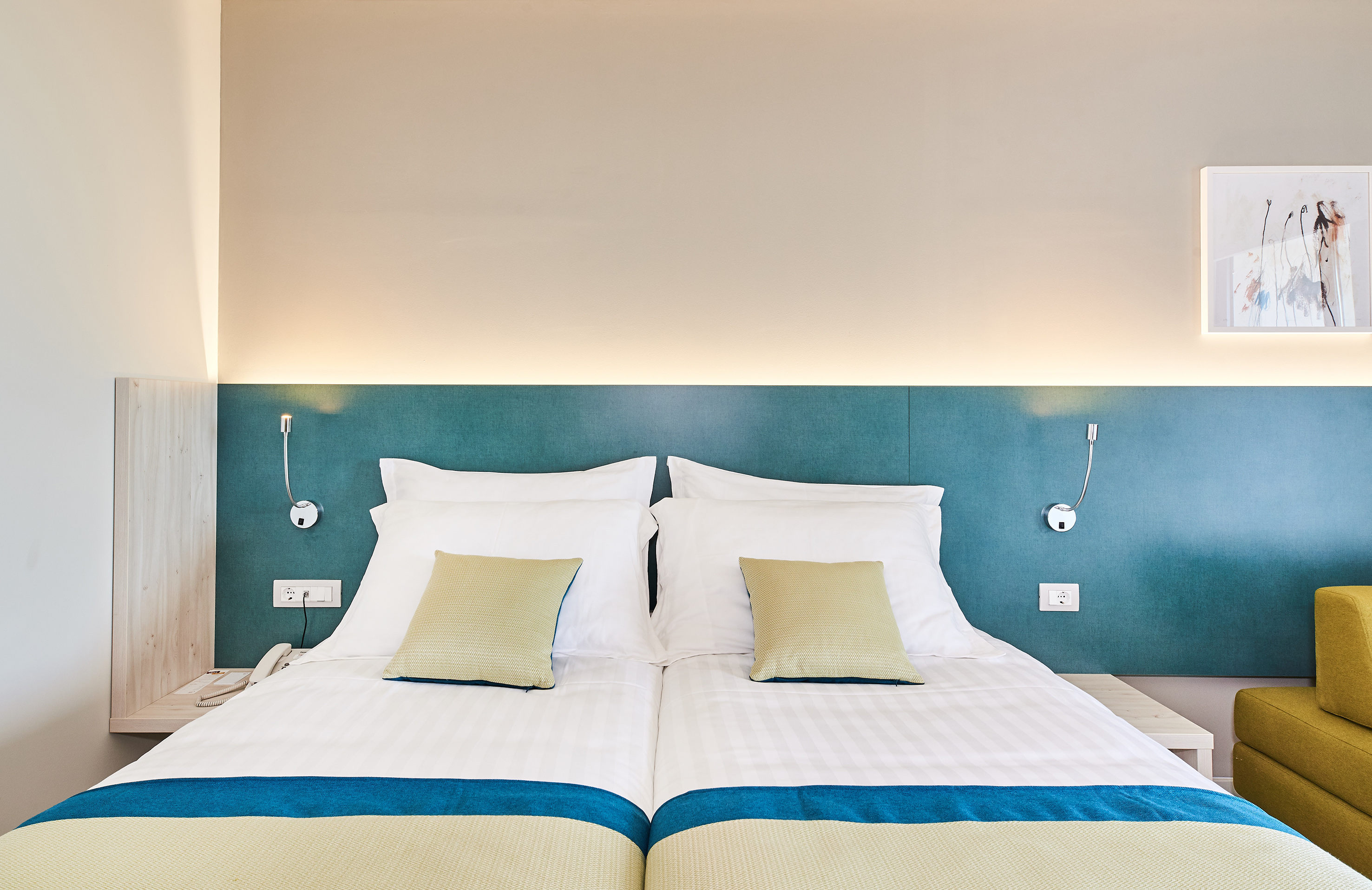 a bed with pillows on it