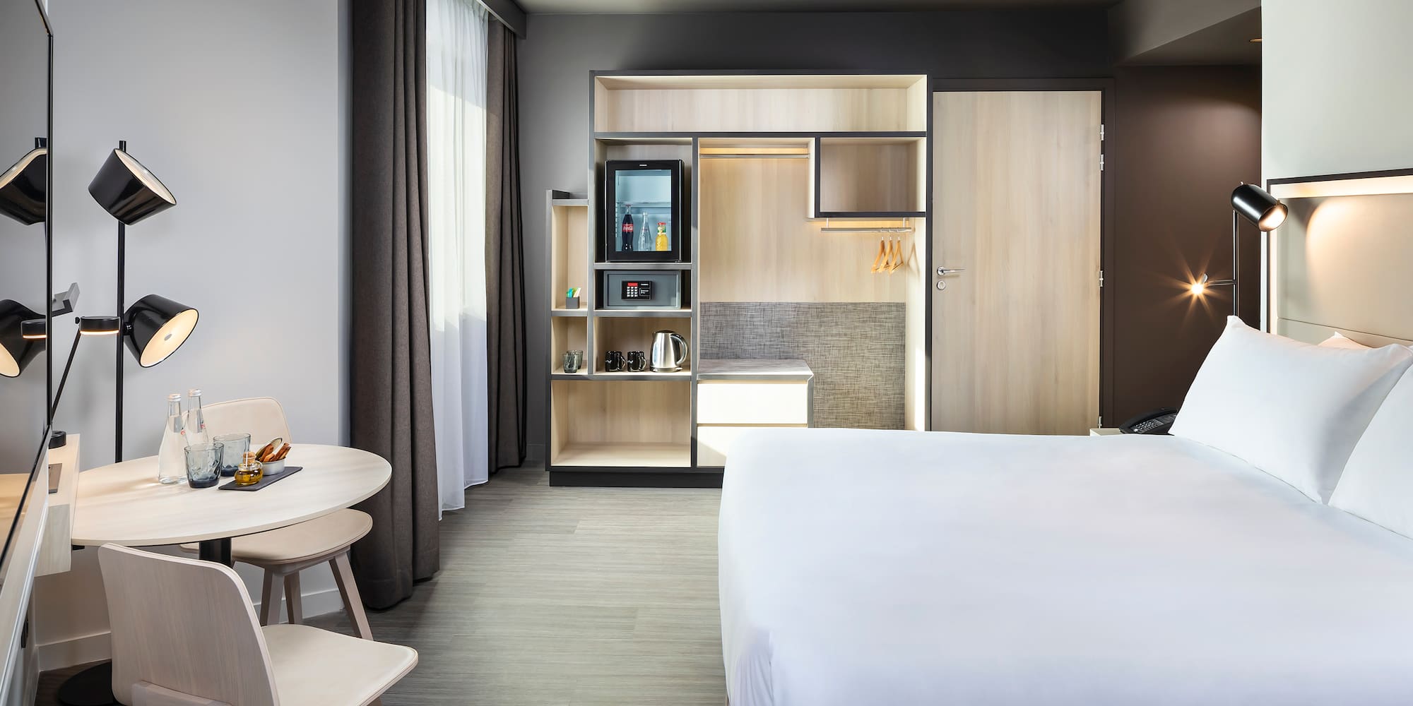 a room with a bed and a table