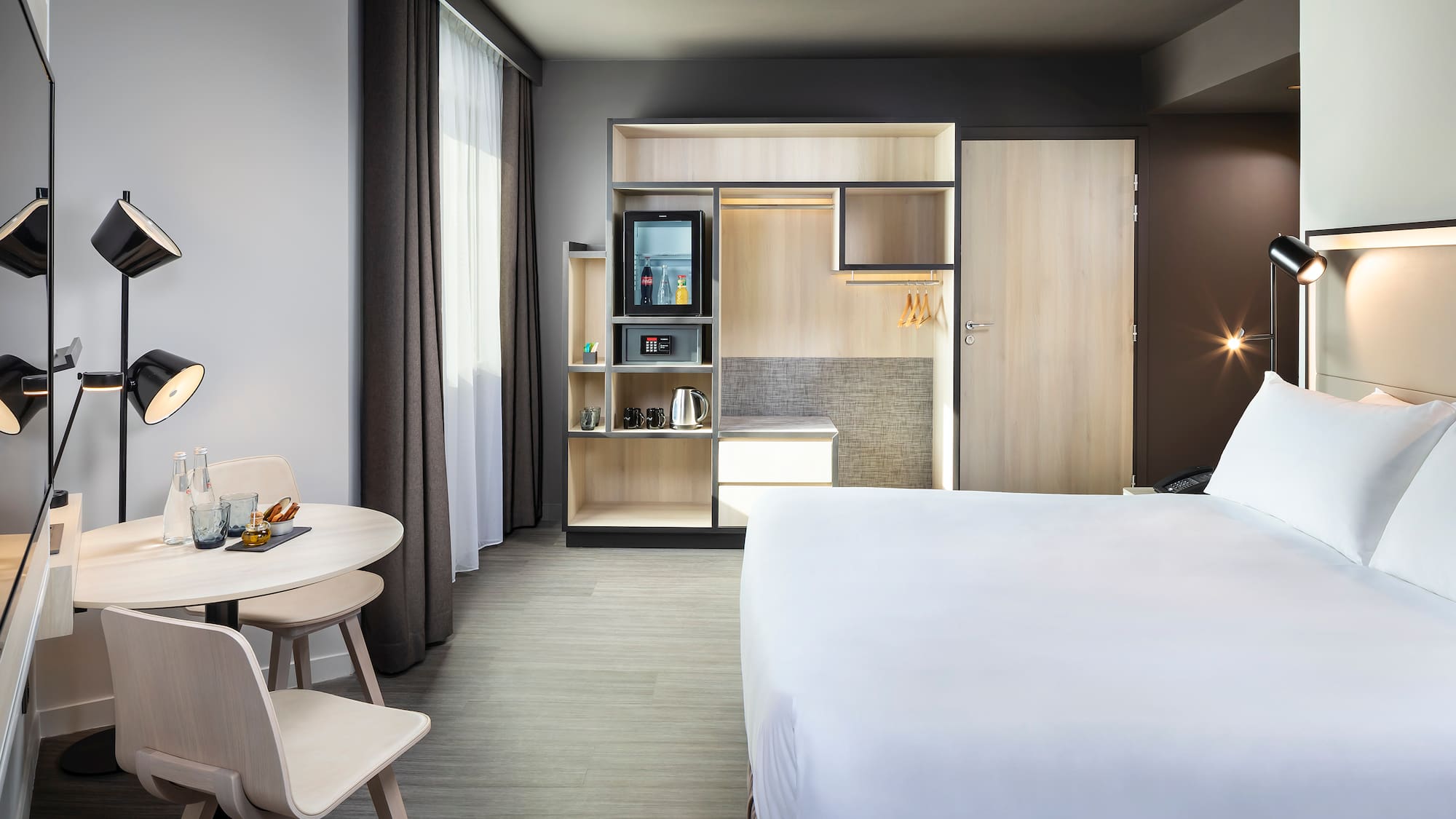 a room with a bed and a table