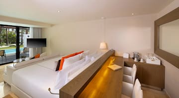 a room with a table and chairs