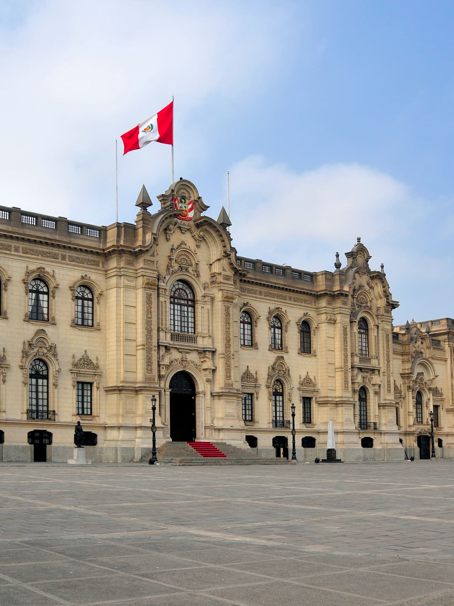 a large building with a flag on top