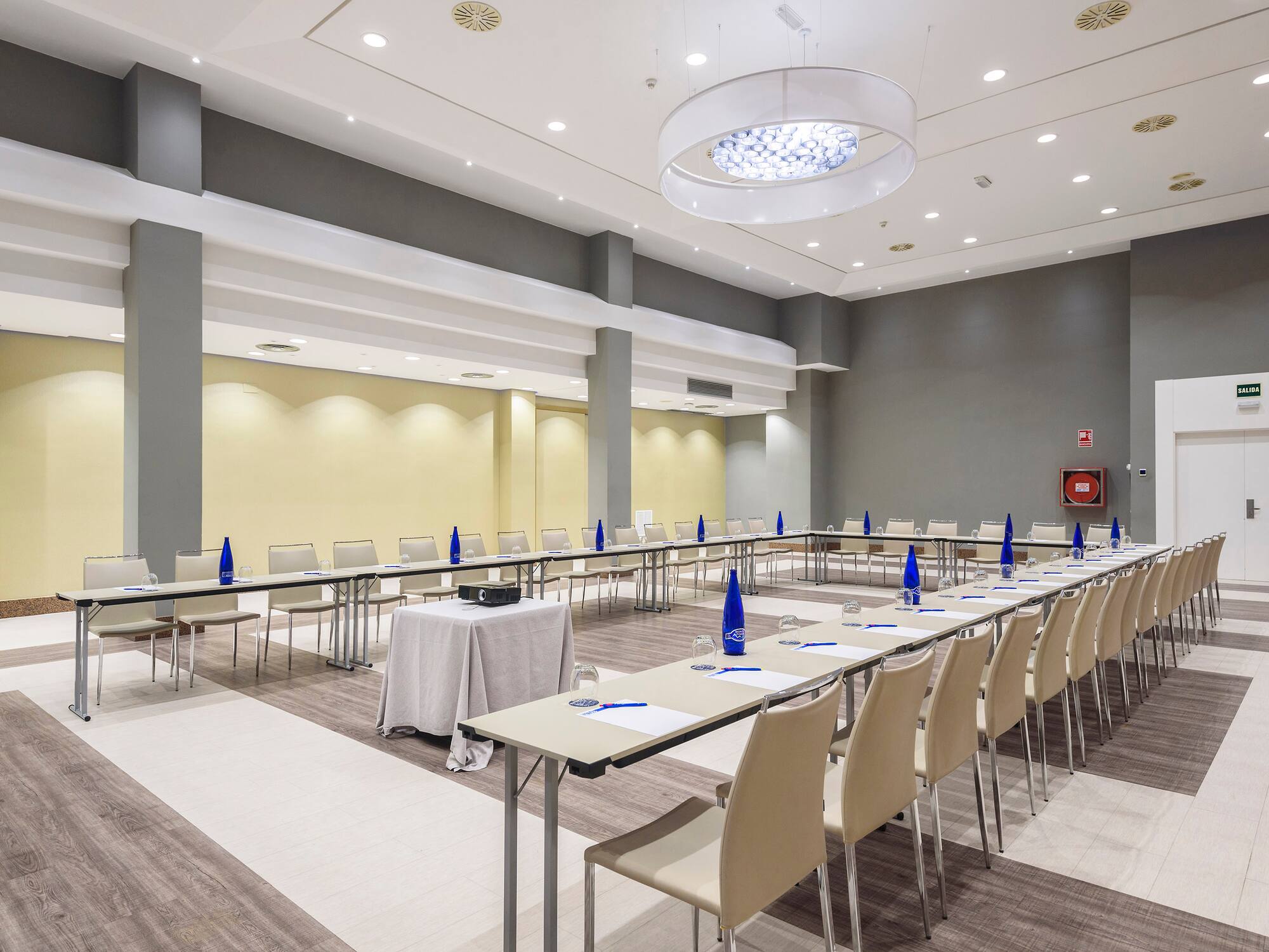 a room with tables and chairs
