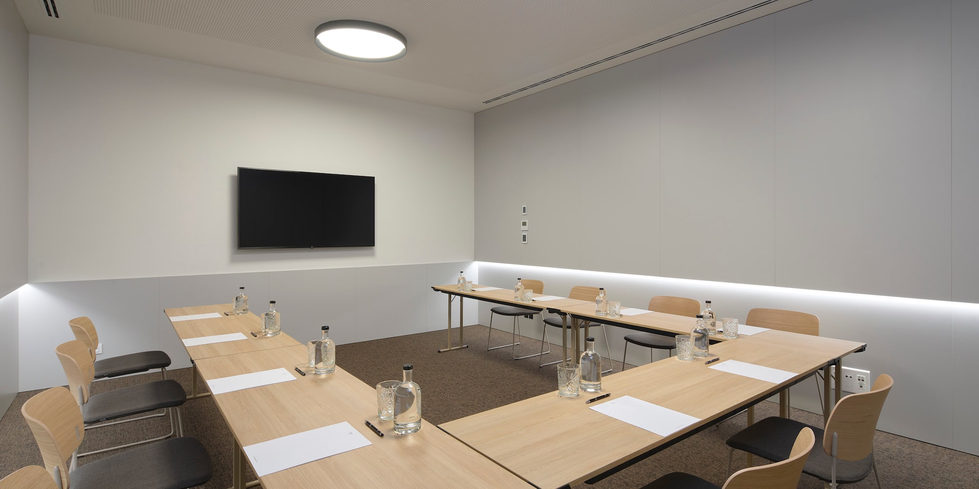 a room with tables and chairs