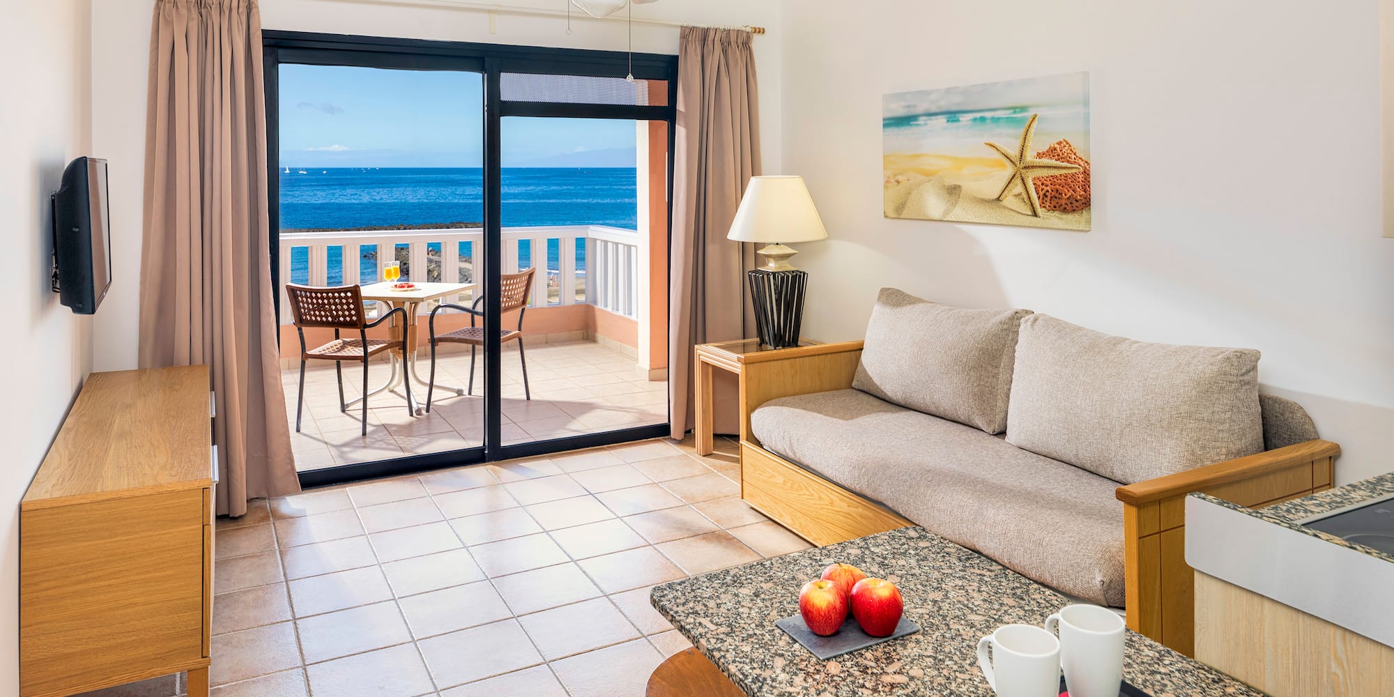 a living room with a couch and a table
